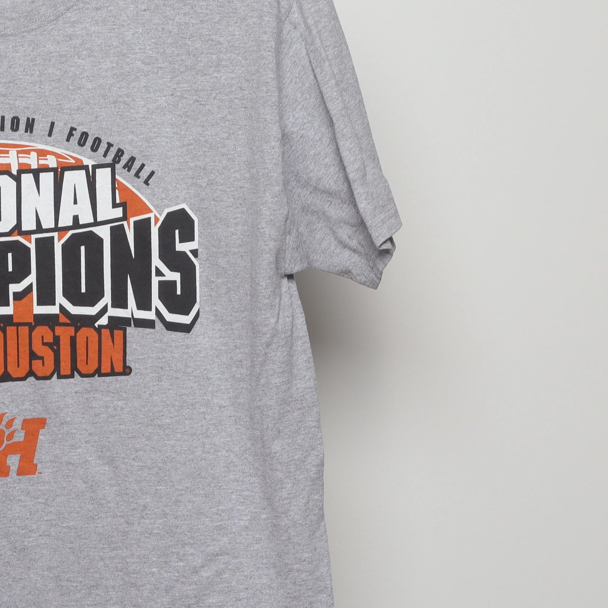 Close-up of the sleeve on the 2020s Sam Houston NCAA Champions Football Tee L