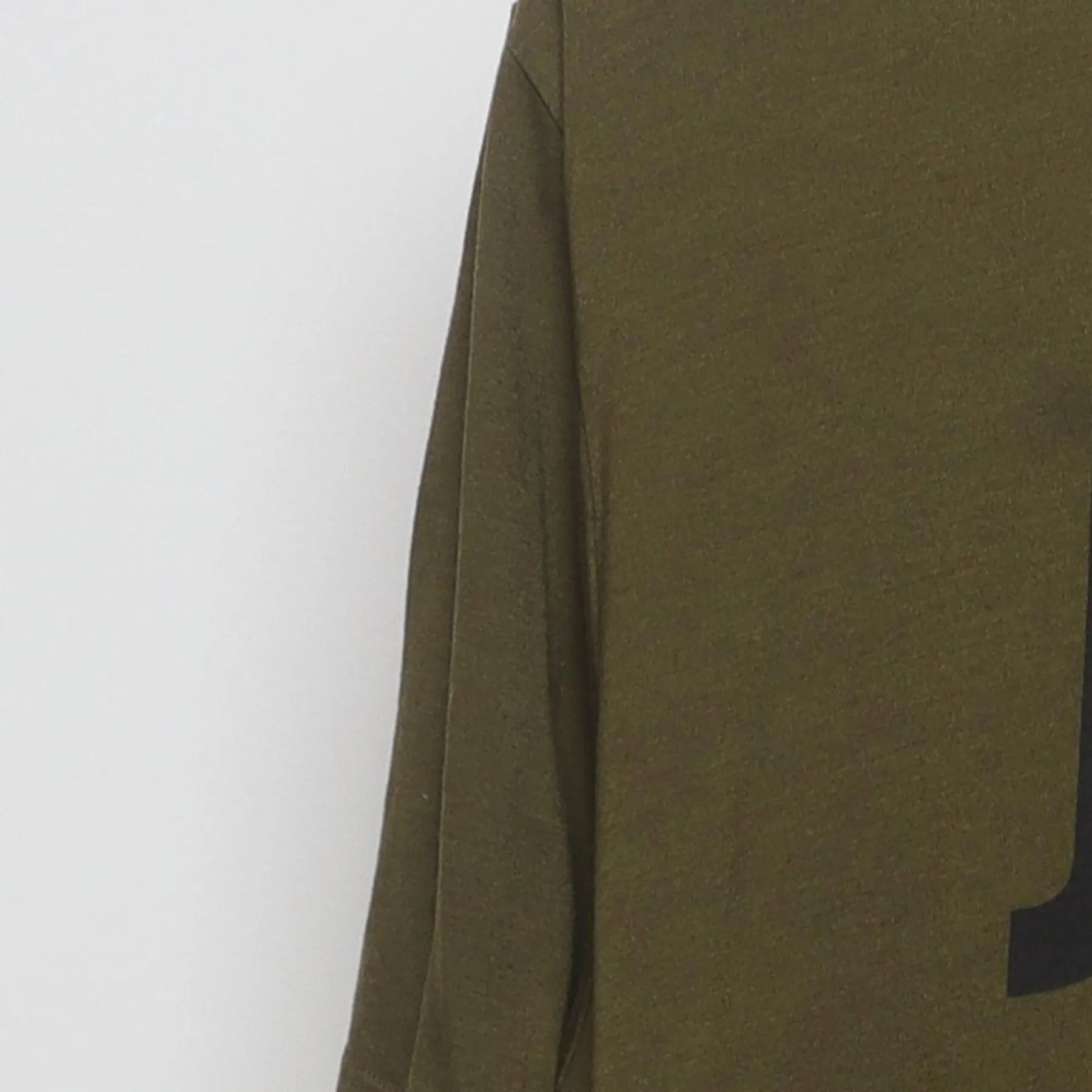 Left sleeve detail of Nike 'Just Do It' Glitch Graphic Dri-Fit T-Shirt Olive Green