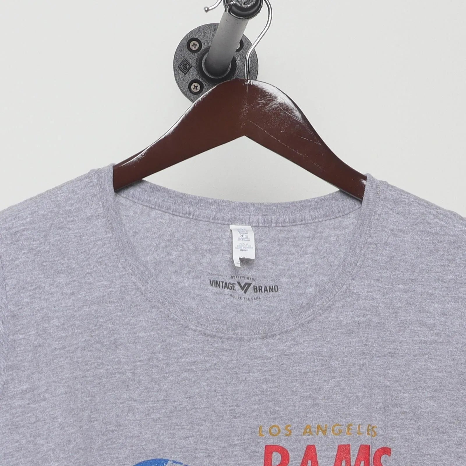 Collar and tag of Vintage 1970s Los Angeles Rams "Throwback Quarterback Graphic" T-Shirt - M