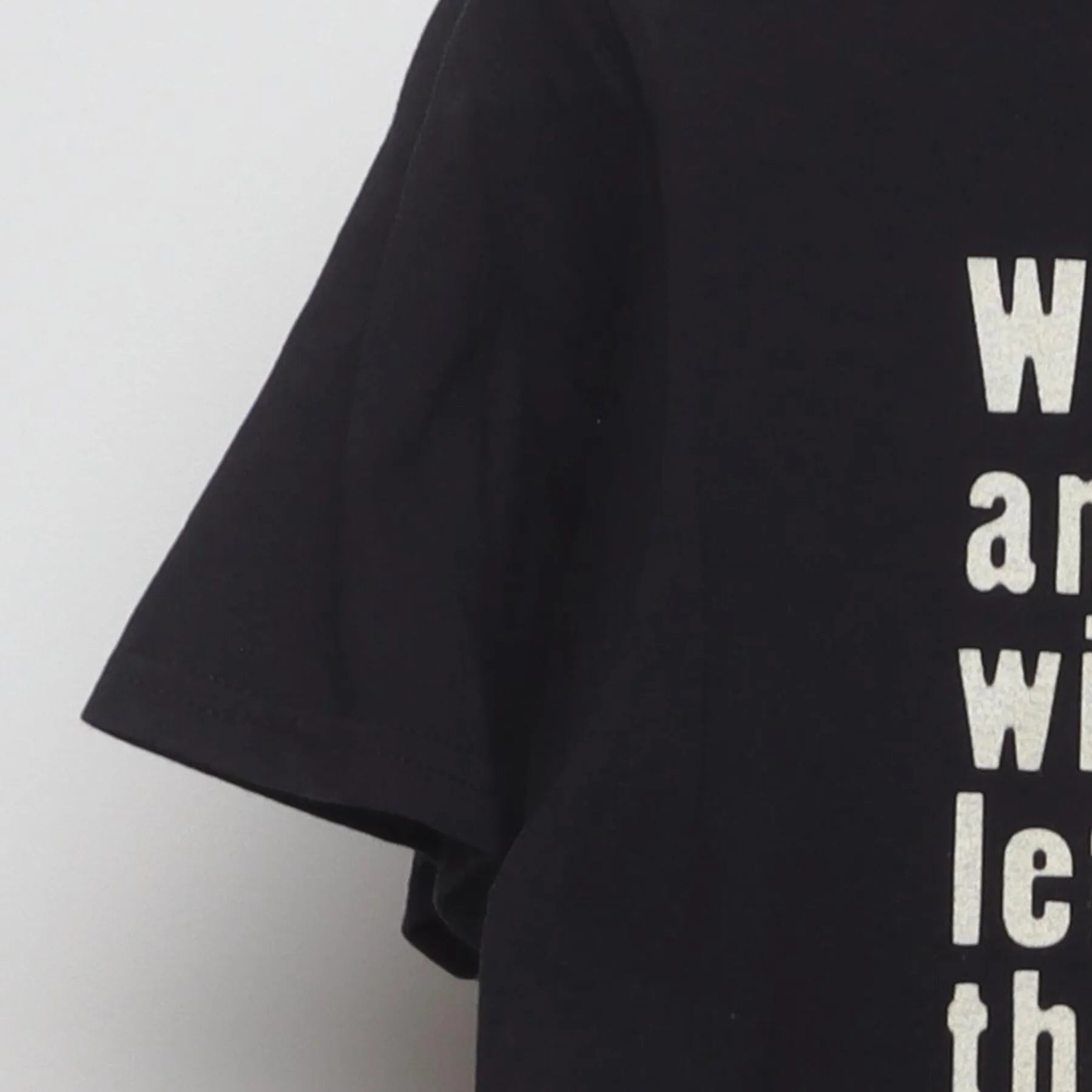 Close-up of the Left sleeve on the Vintage Y2K WWF "The Chainsaw Charlie Massacre" T-Shirt - M