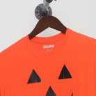 Close-up of the collar and tag on the Vintage Y2K Halloween "Jack-O'-Lantern Face" T-Shirt - S