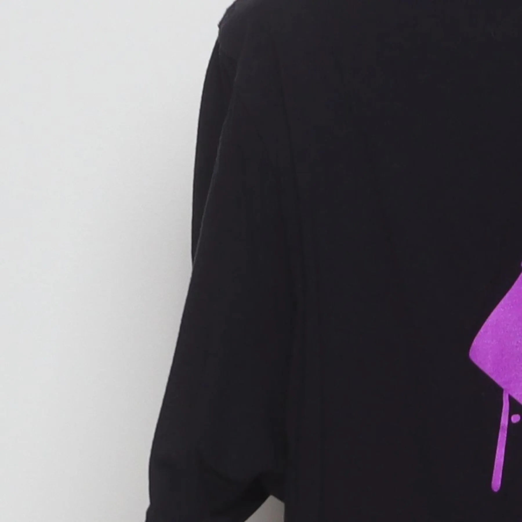 Close-up of the Left sleeve on the Vintage Y2K Extrax "Graffiti Smiley" T-Shirt - M