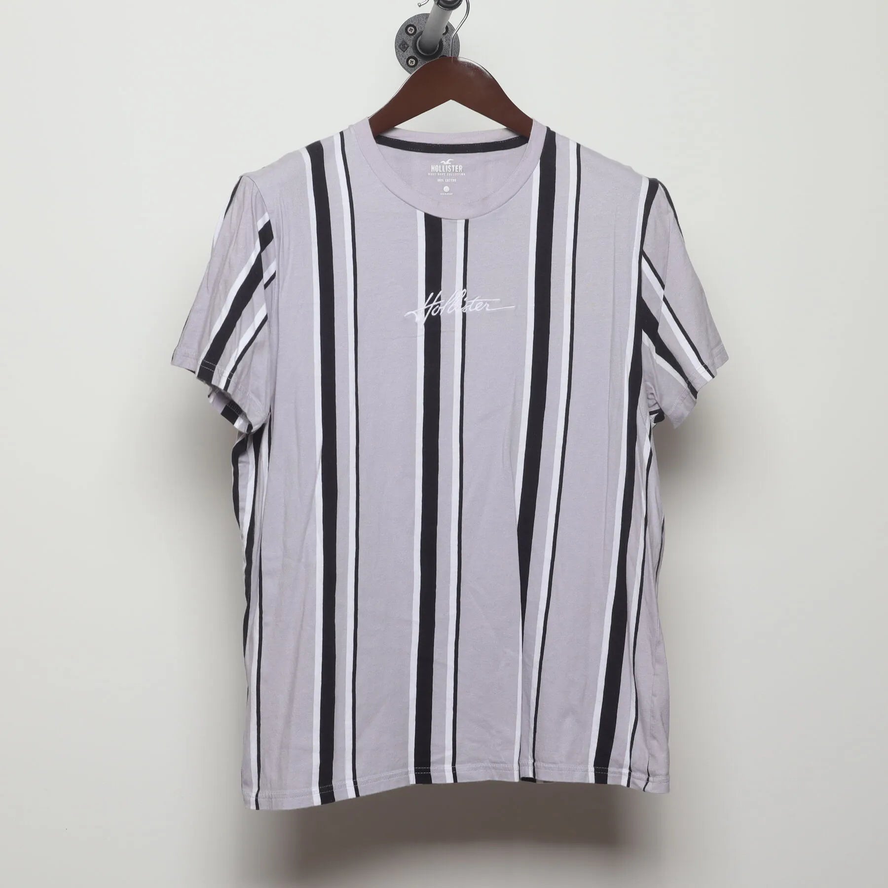 Front view of Vintage Y2K Hollister "Embroidered Script Logo Striped" T-Shirt - M