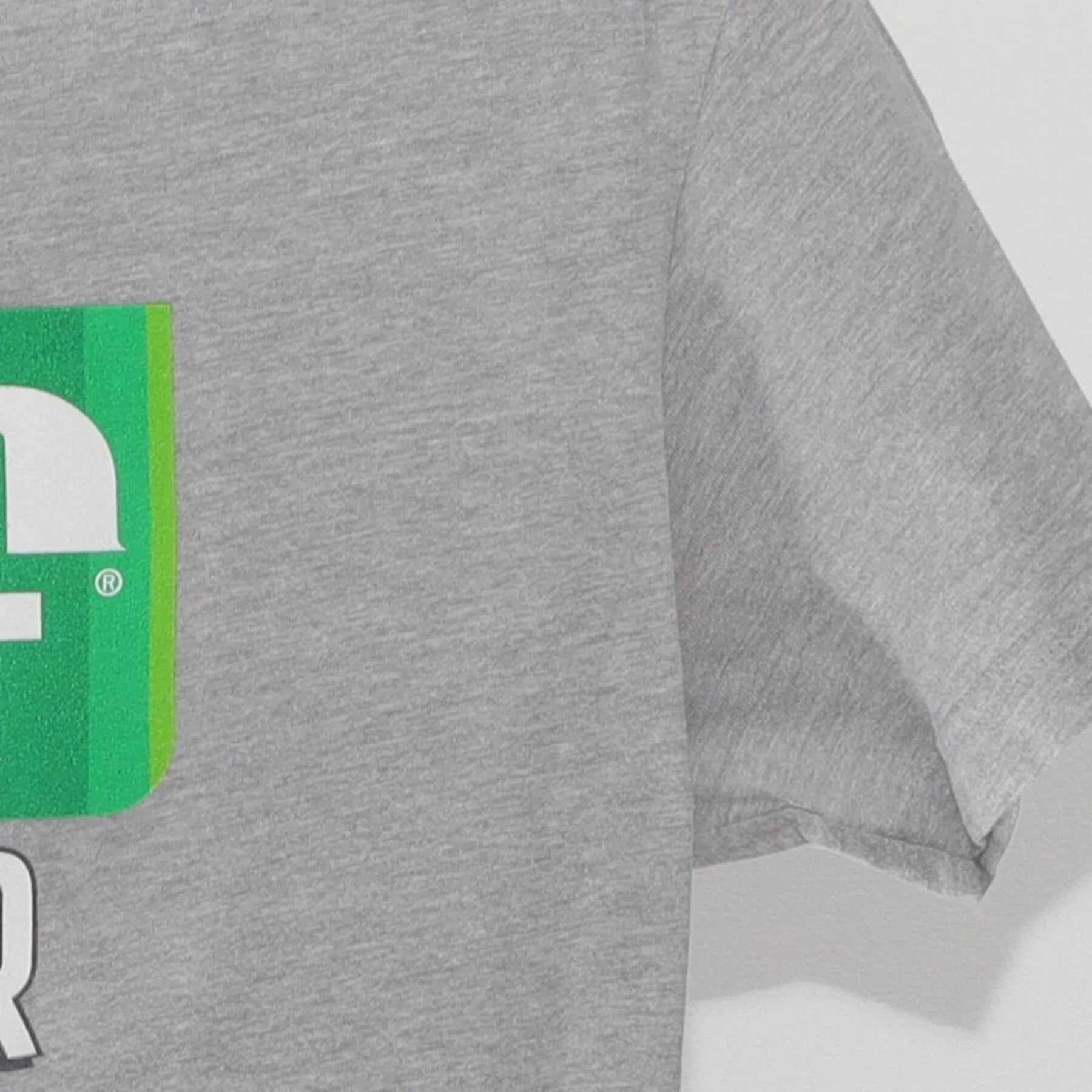 Close-up of the Right sleeve on the Vintage 2010s Jif "Power Ups" T-Shirt - XS