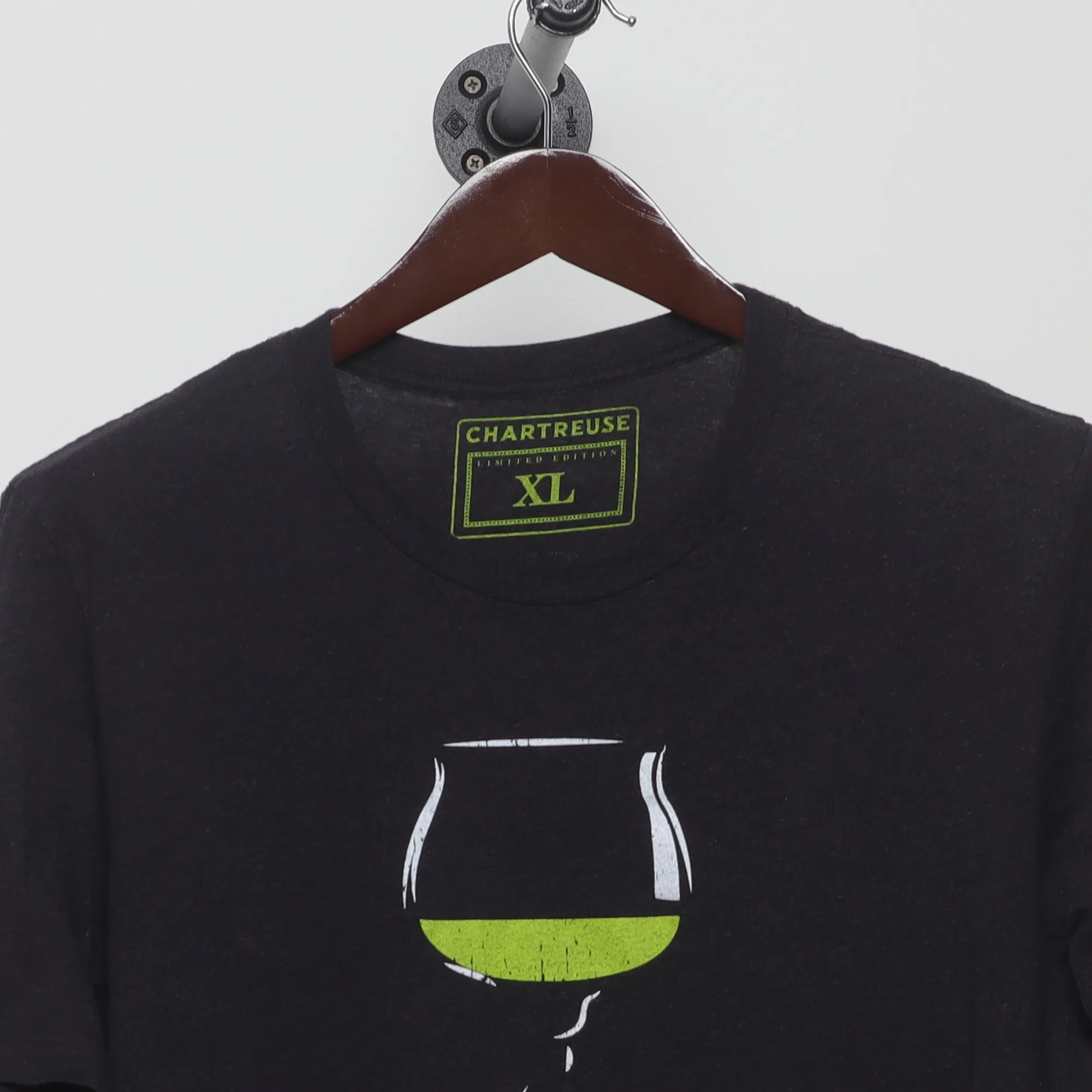 Close-up of the collar and tag on the Modern Chartreuse Liqueur Graphic T-Shirt L