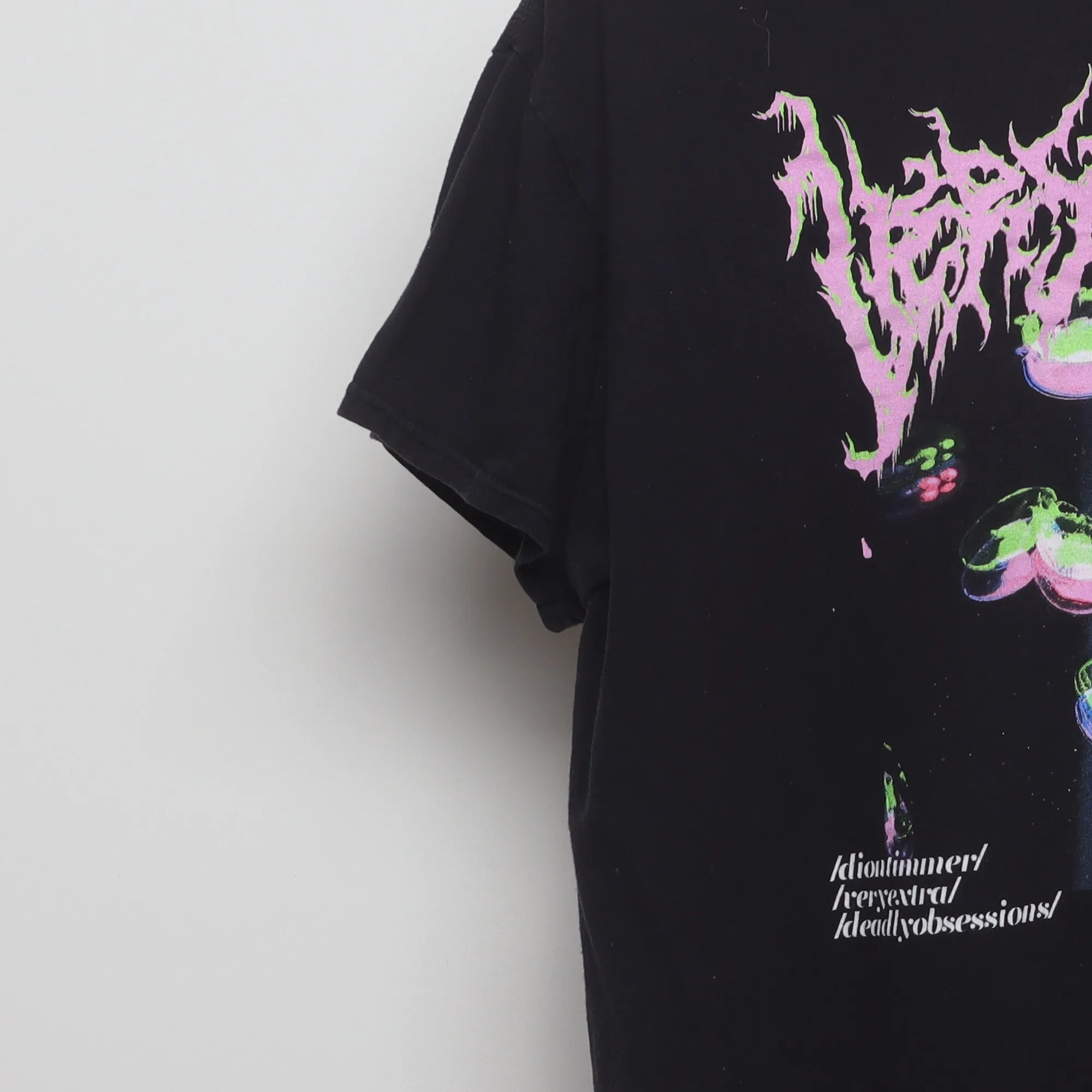 Close-up of the sleeve on the Modern Dion Limmer Vaporwave Graphic T-Shirt L