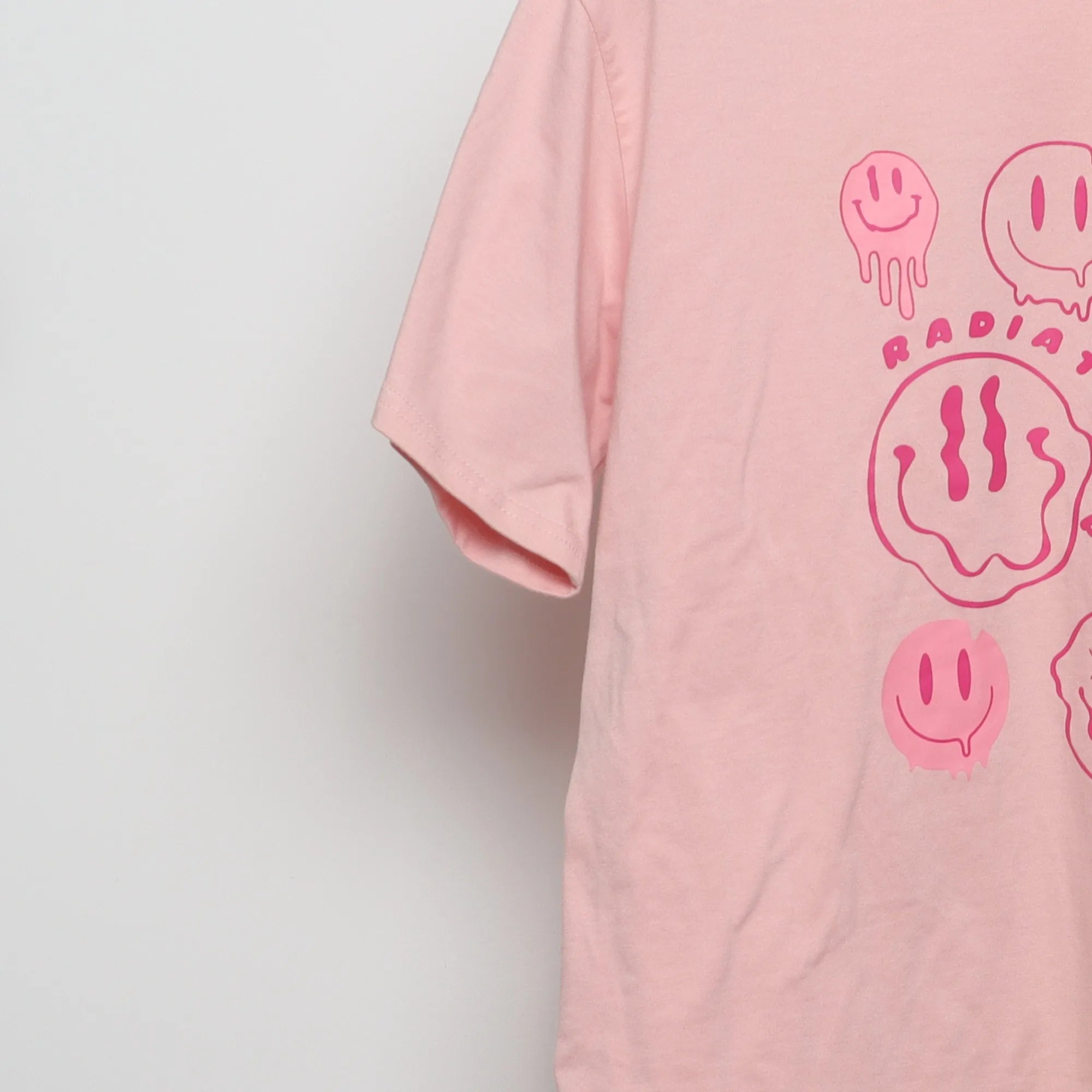 Close-up of the sleeve on the Modern Drippy Smiley Face Graphic Tee L