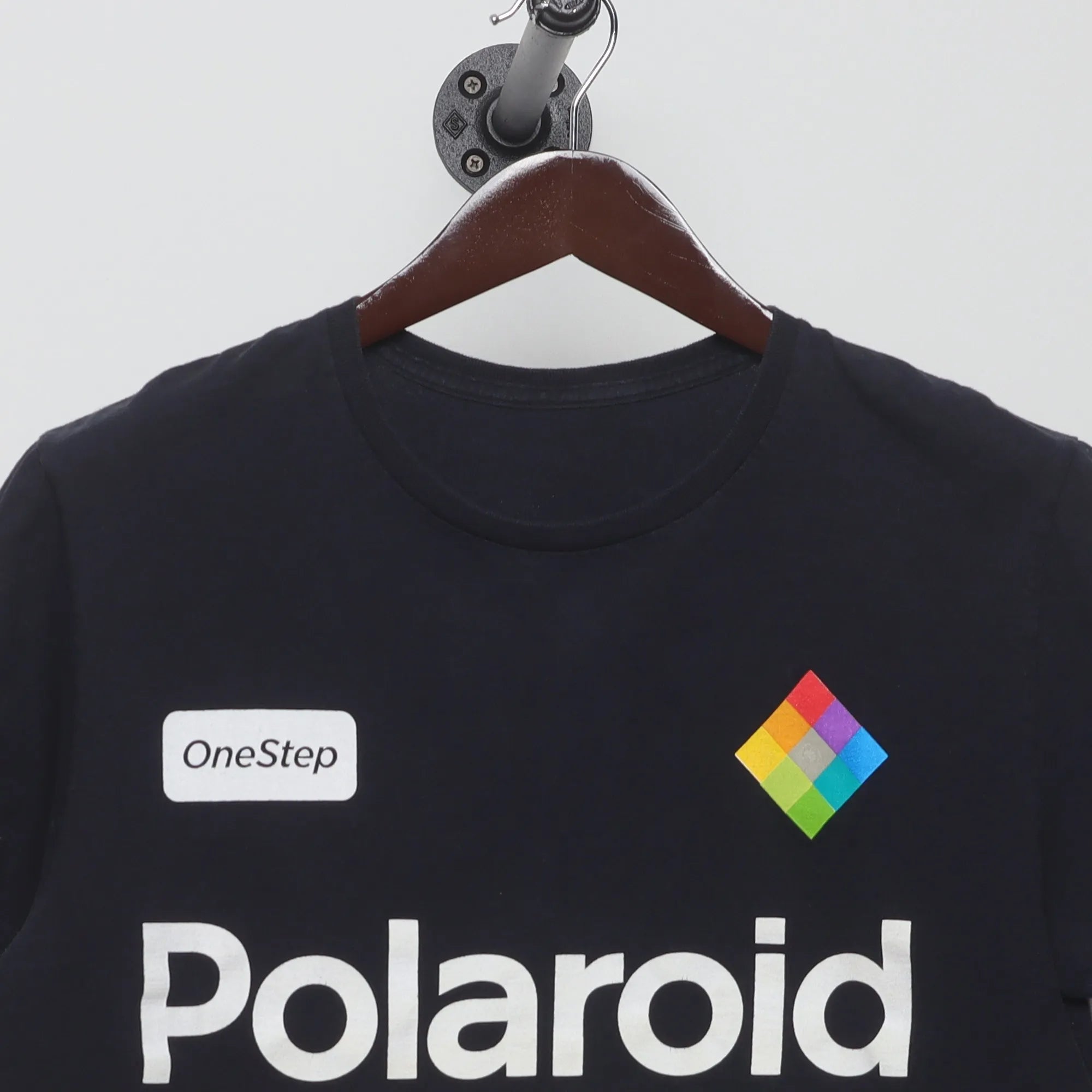 Close-up of the collar and tag on the Modern Polaroid Retro Rainbow Logo T-Shirt M