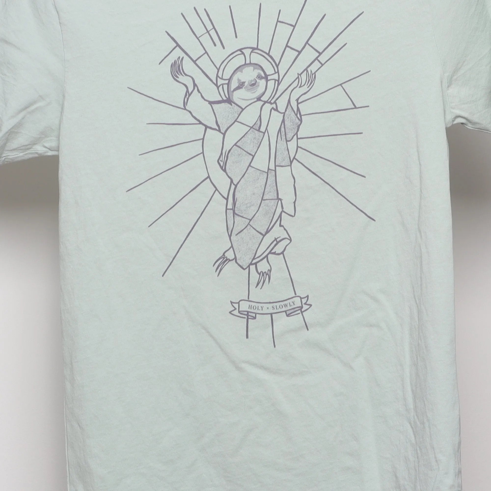 Close-up of the main graphic on the Modern Sloth Saint Parody Graphic T-Shirt XS