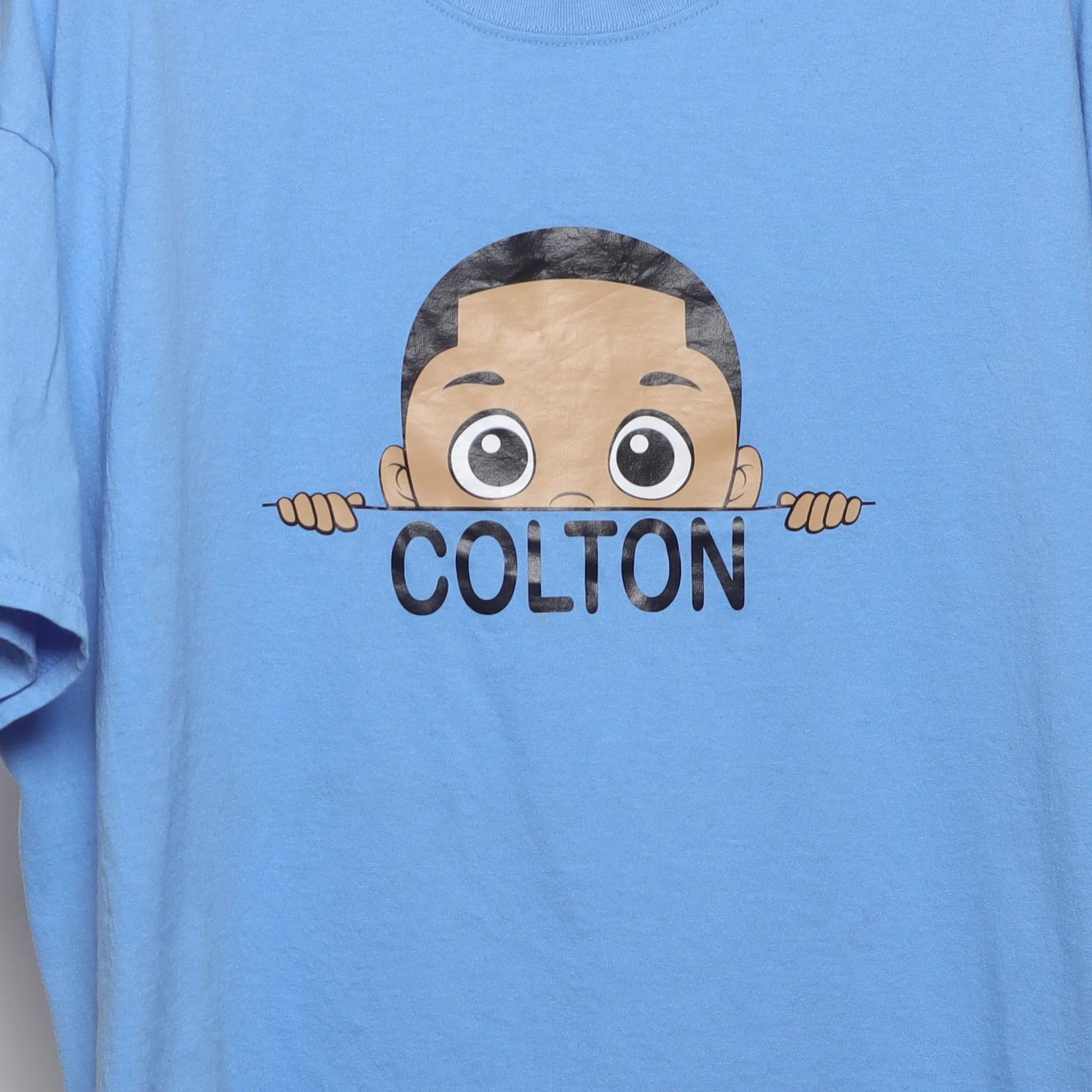 Close-up of the main graphic on the Modern Y2K Style Colton Cartoon Graphic T-Shirt XL