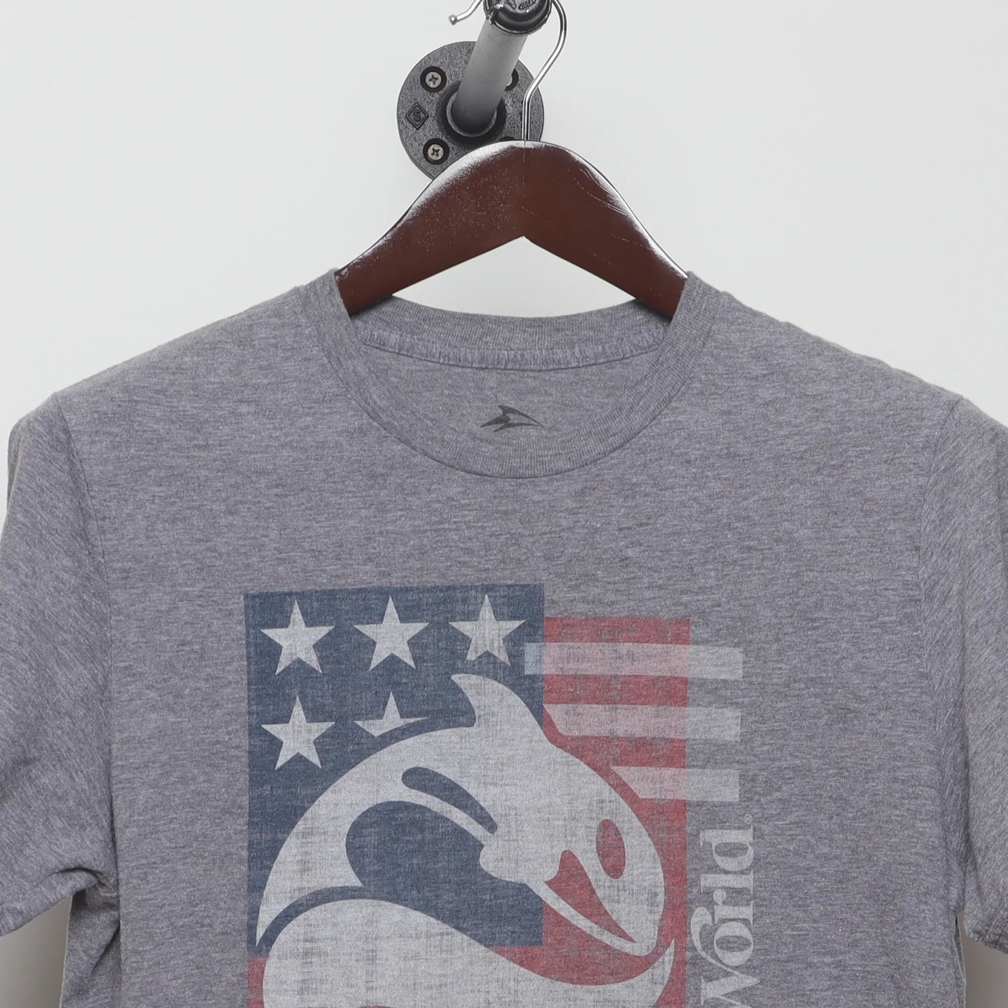 Close-up of the collar and tag on the Retro Sea World American Flag Graphic Tee M