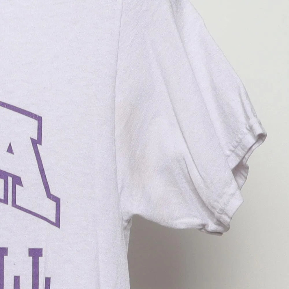 Close-up of the sleeve on the Vintage 1980s NASA "Volleyball Team" T-Shirt - S