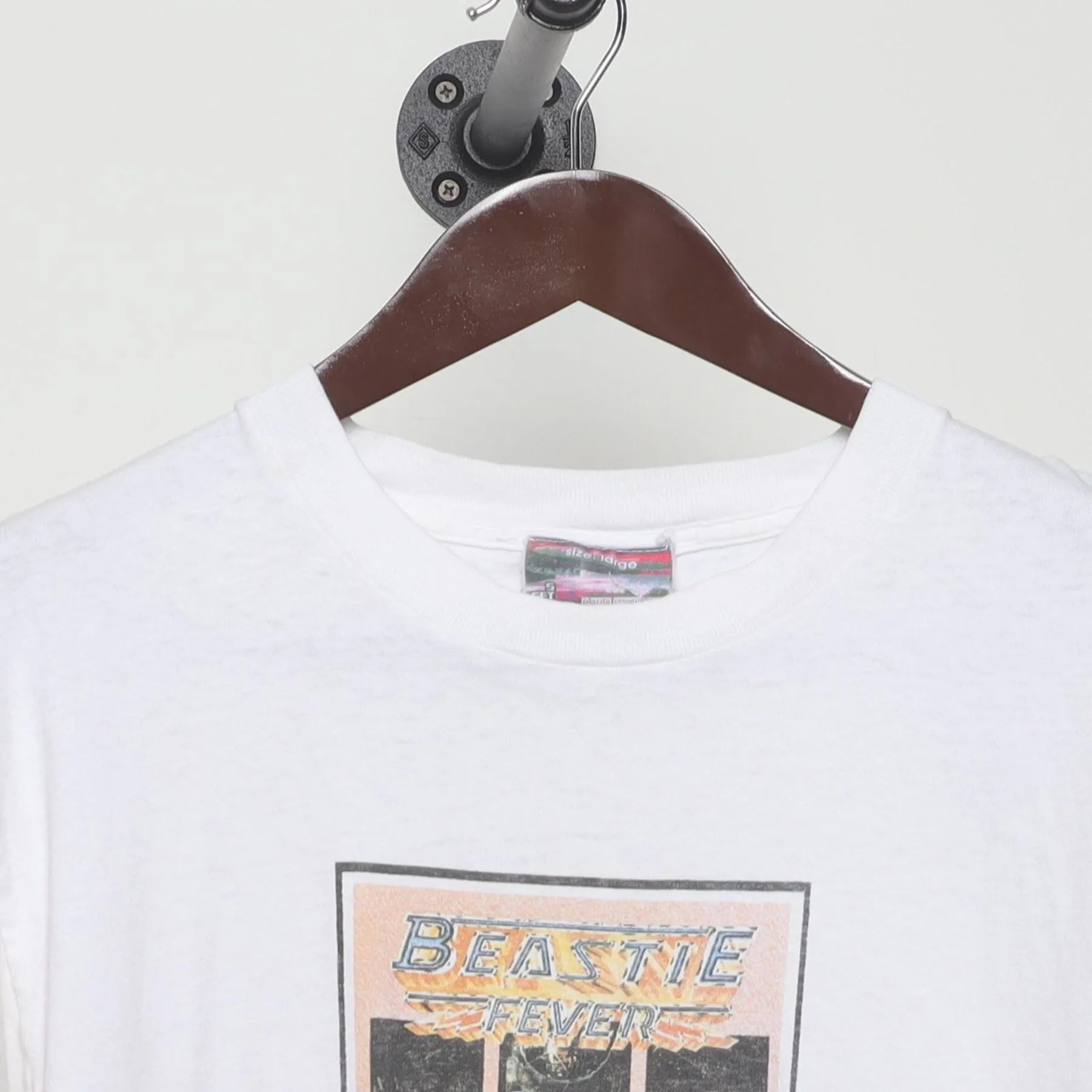 Close-up of the collar and tag on the Vintage 1990s Beastie Boys "Beastie Fever" T-Shirt - L