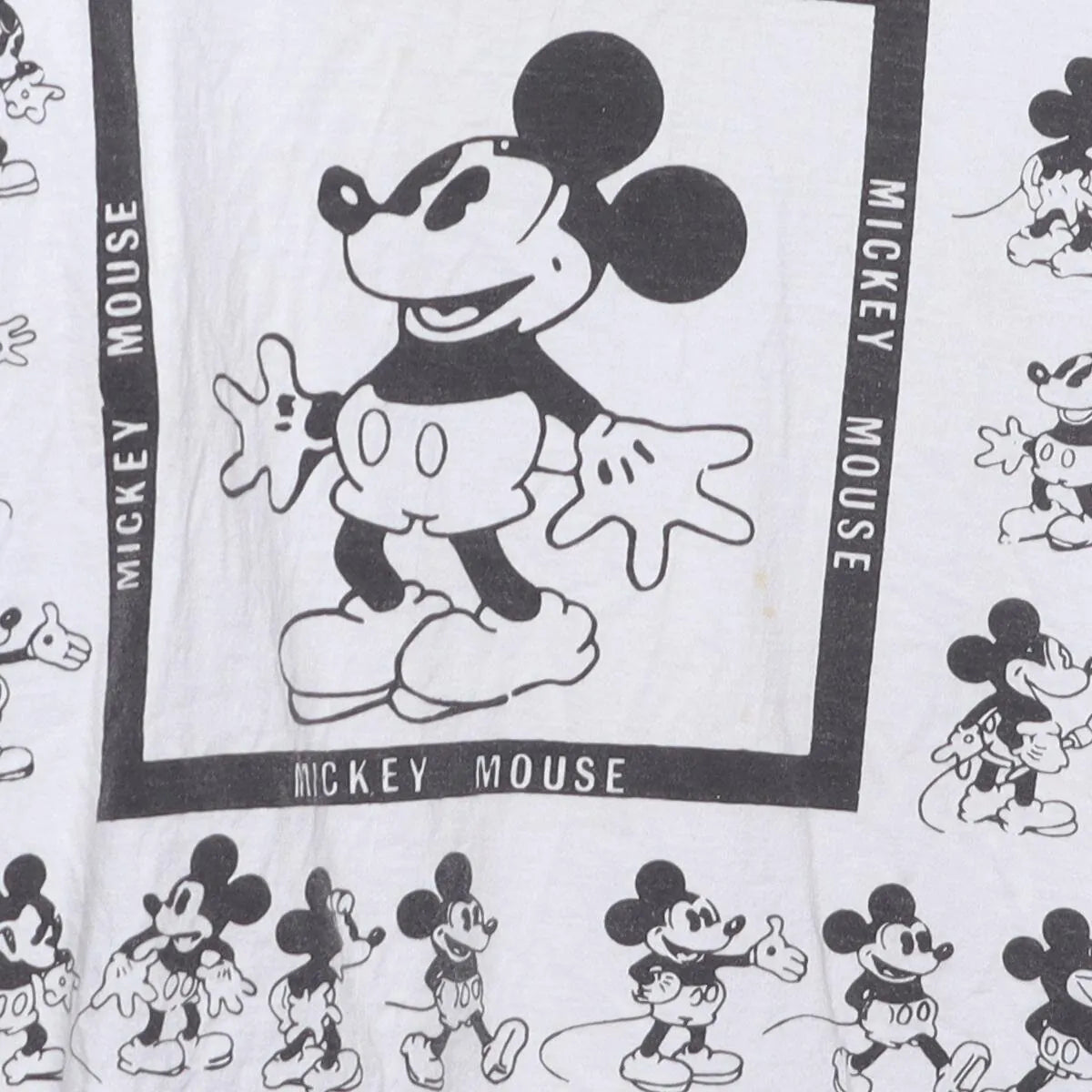 Close-up of the main graphic on the Vintage 1990s Disney "Mickey Mouse All-Over Print" T-Shirt - L