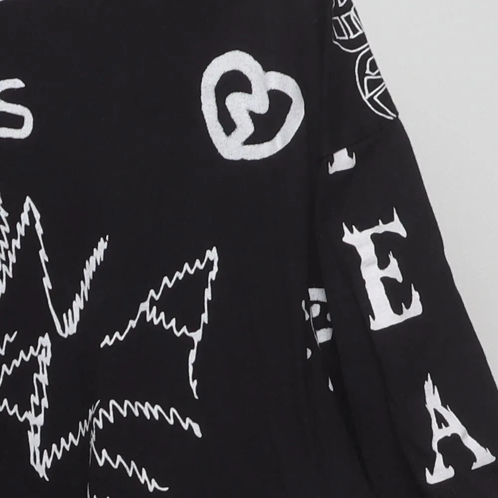 Close-up of the sleeve on the Vintage 1990s Graffiti Art "Chaos & Peace" All Over Print T-Shirt - XXL