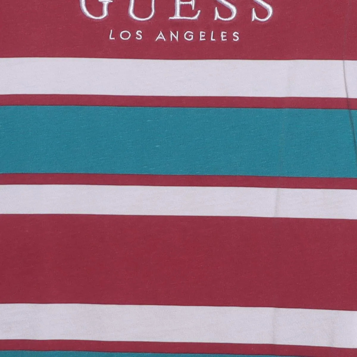 Close-up of the main graphic on the Vintage 1990s Guess "Striped Logo" T-Shirt - XL