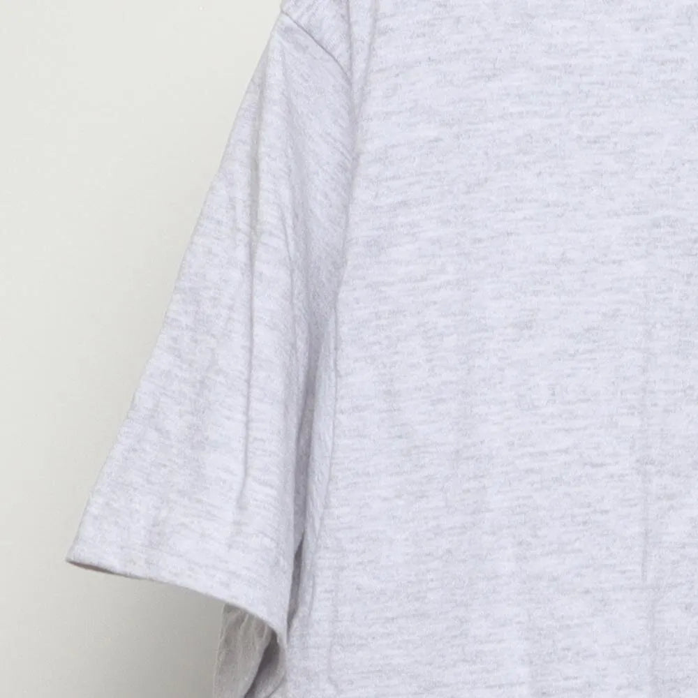 Close-up of the sleeve on the Vintage 1990s Harley-Davidson "HMS Rose" T-Shirt - L