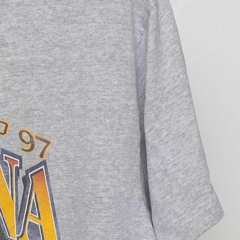 Close-up of the sleeve on the Vintage 1990s Michigan Wolverines "1997 Undefeated to Pasadena" T-Shirt - L