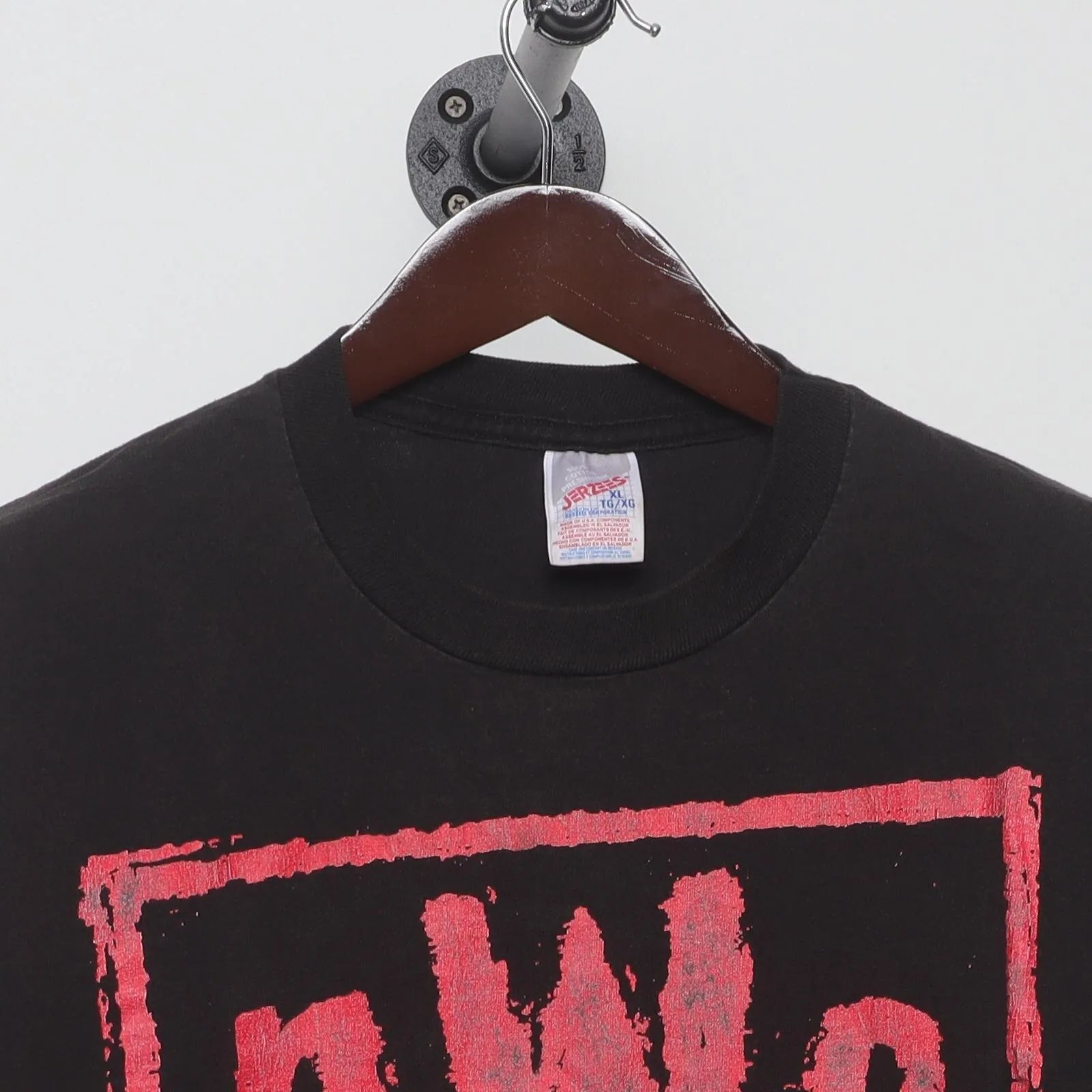 Close-up of the collar and tag on the Vintage 1990s nWo "Bad Has Arrived" T-Shirt - XL