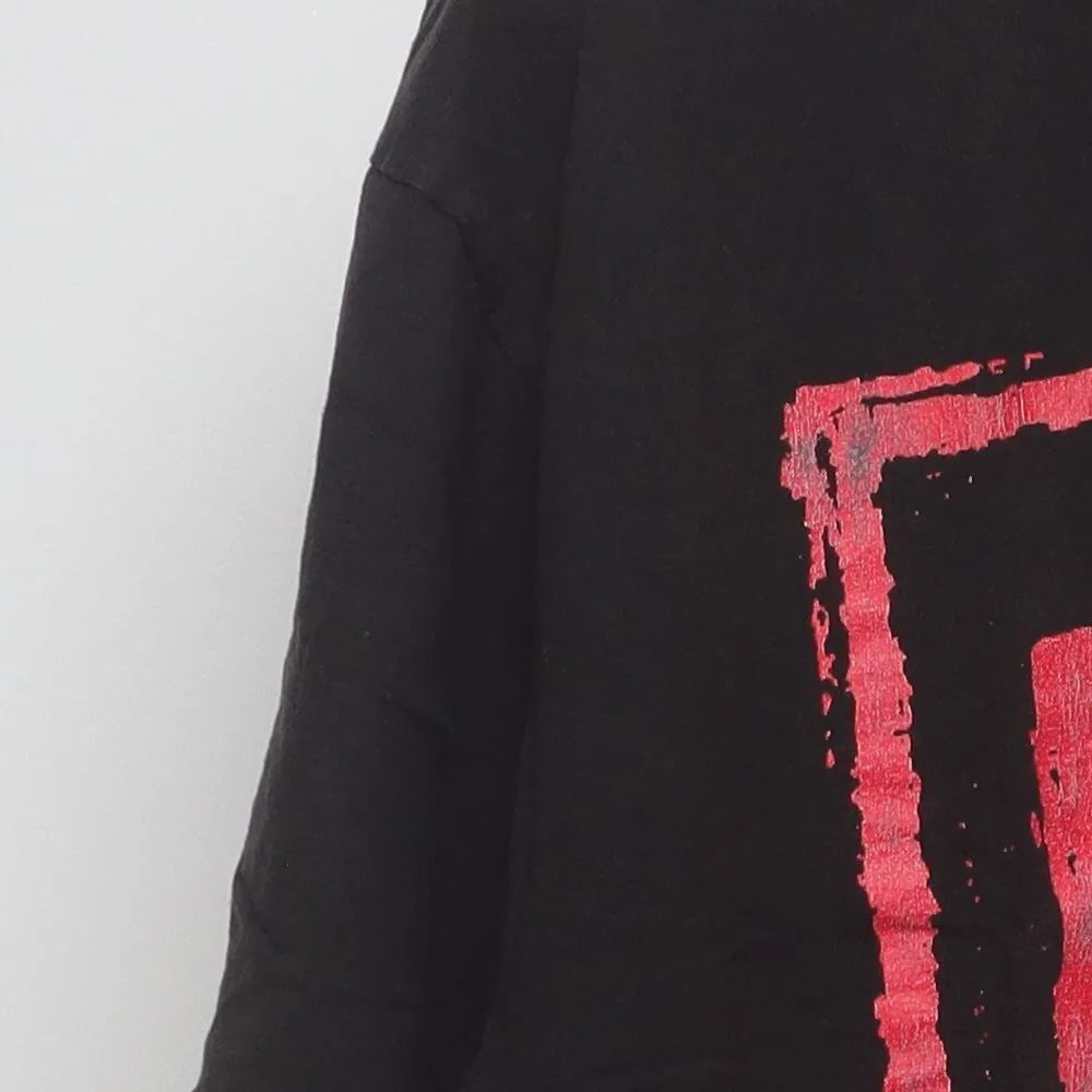Close-up of the sleeve on the Vintage 1990s nWo "Bad Has Arrived" T-Shirt - XL