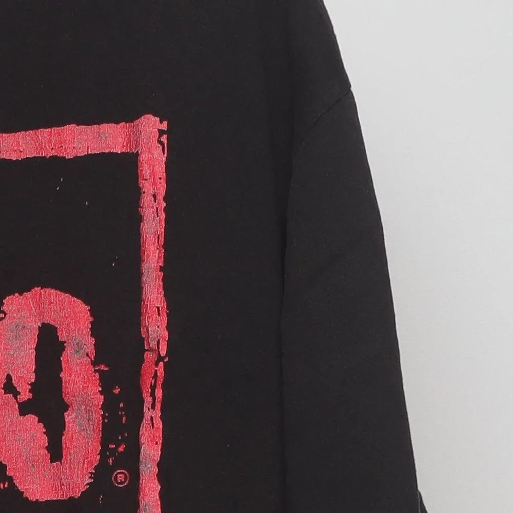 Close-up of the sleeve on the Vintage 1990s nWo "Bad Has Arrived" T-Shirt - XL