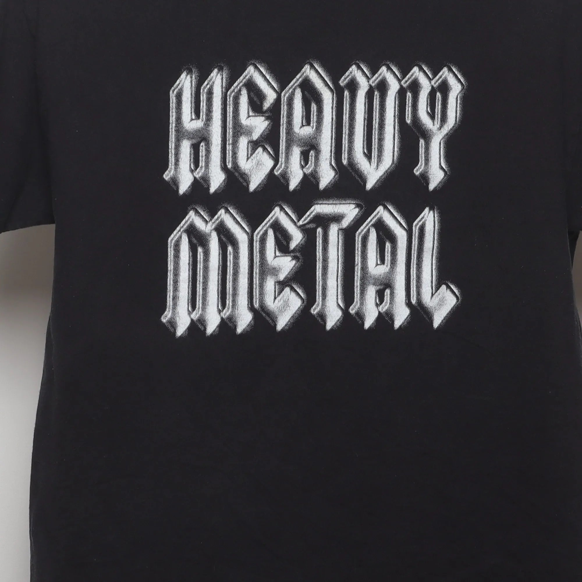 Close-up of the main graphic on the Vintage 2000s Heavy Metal Graphic T-Shirt M