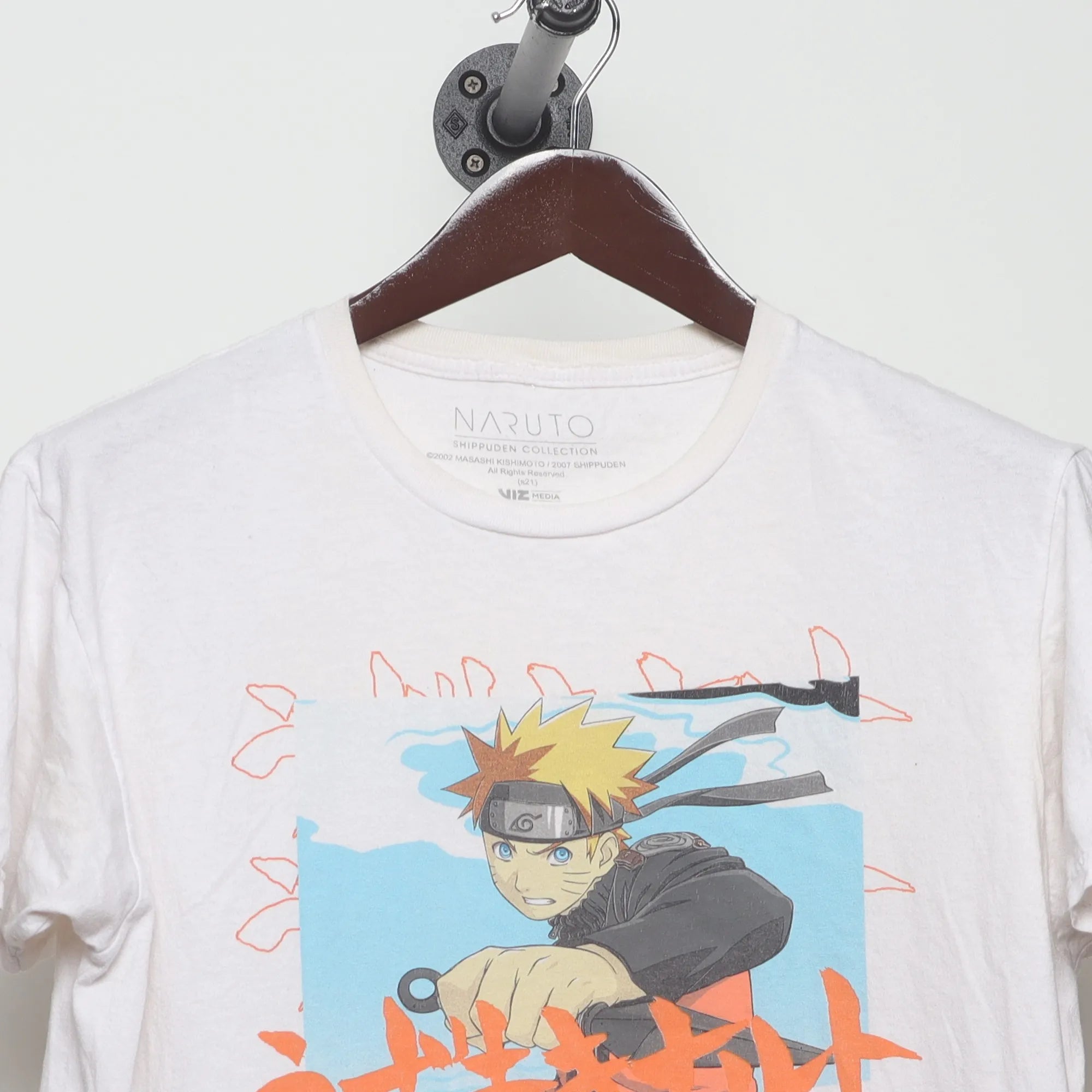 Close-up of the collar and tag on the Vintage 2000s Naruto Shippuden Anime T-Shirt M
