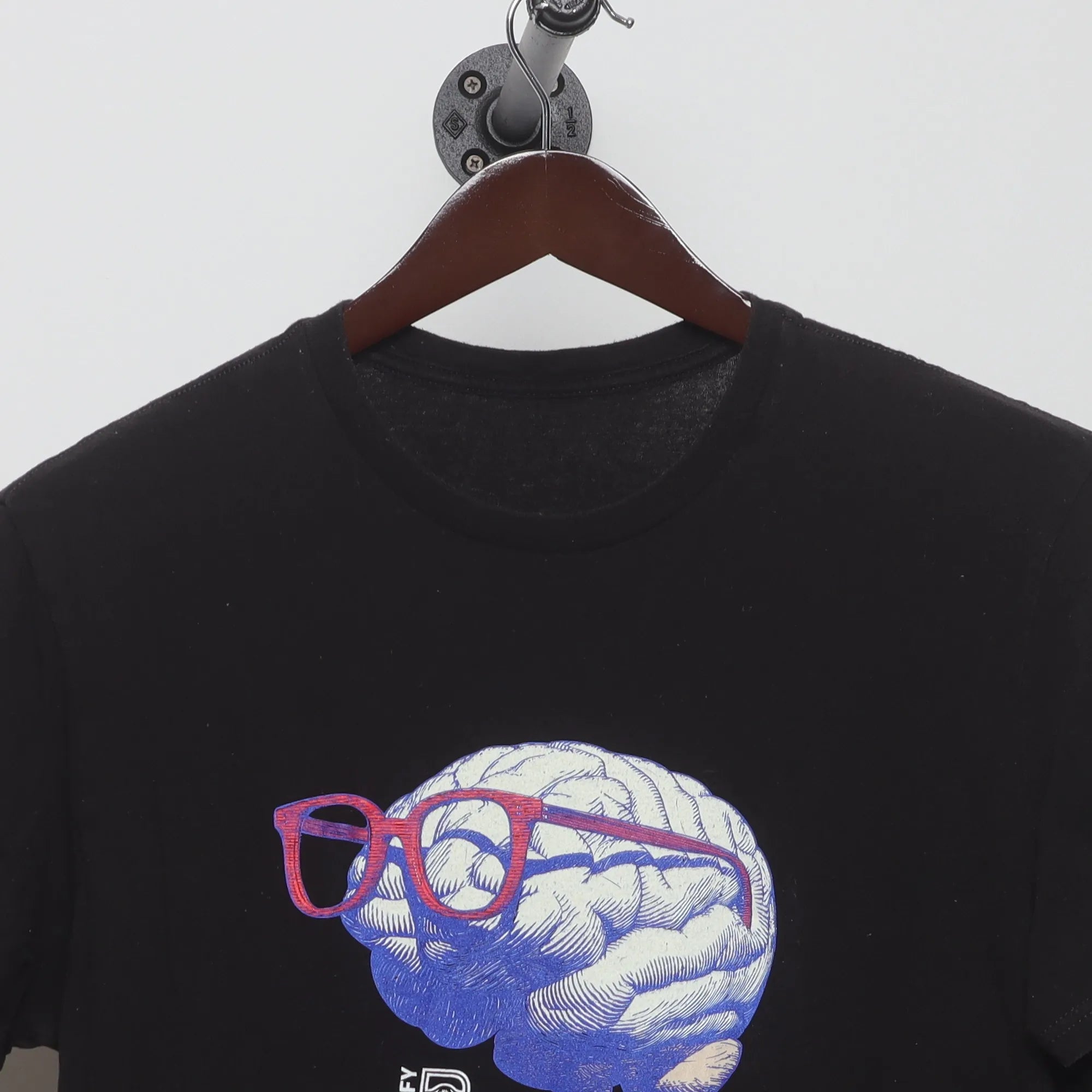 Close-up of the collar and tag on the Vintage 2010s Defy Brain Glasses Graphic T-Shirt M