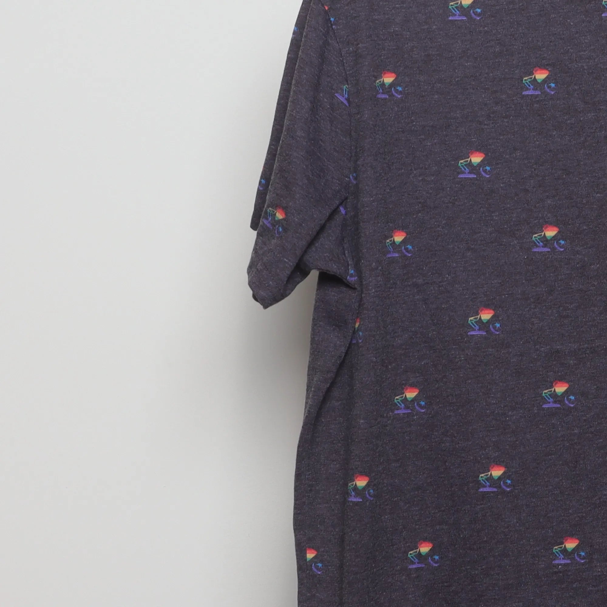 Close-up of the sleeve on the Vintage 2010s Disney Pixar Pride Lamp T-Shirt L