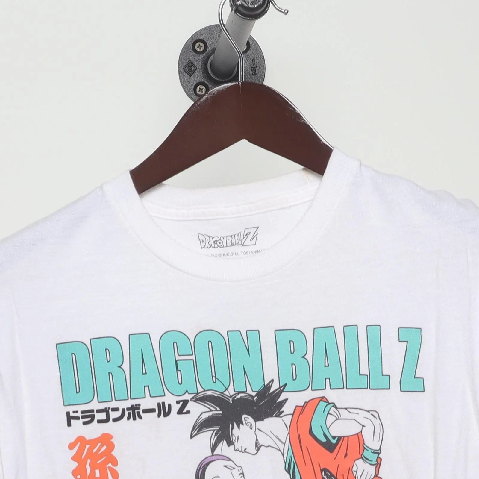 Close-up of the collar and tag on the Vintage 2010s Dragon Ball Z "Goku vs. Frieza Saga" T-Shirt - S