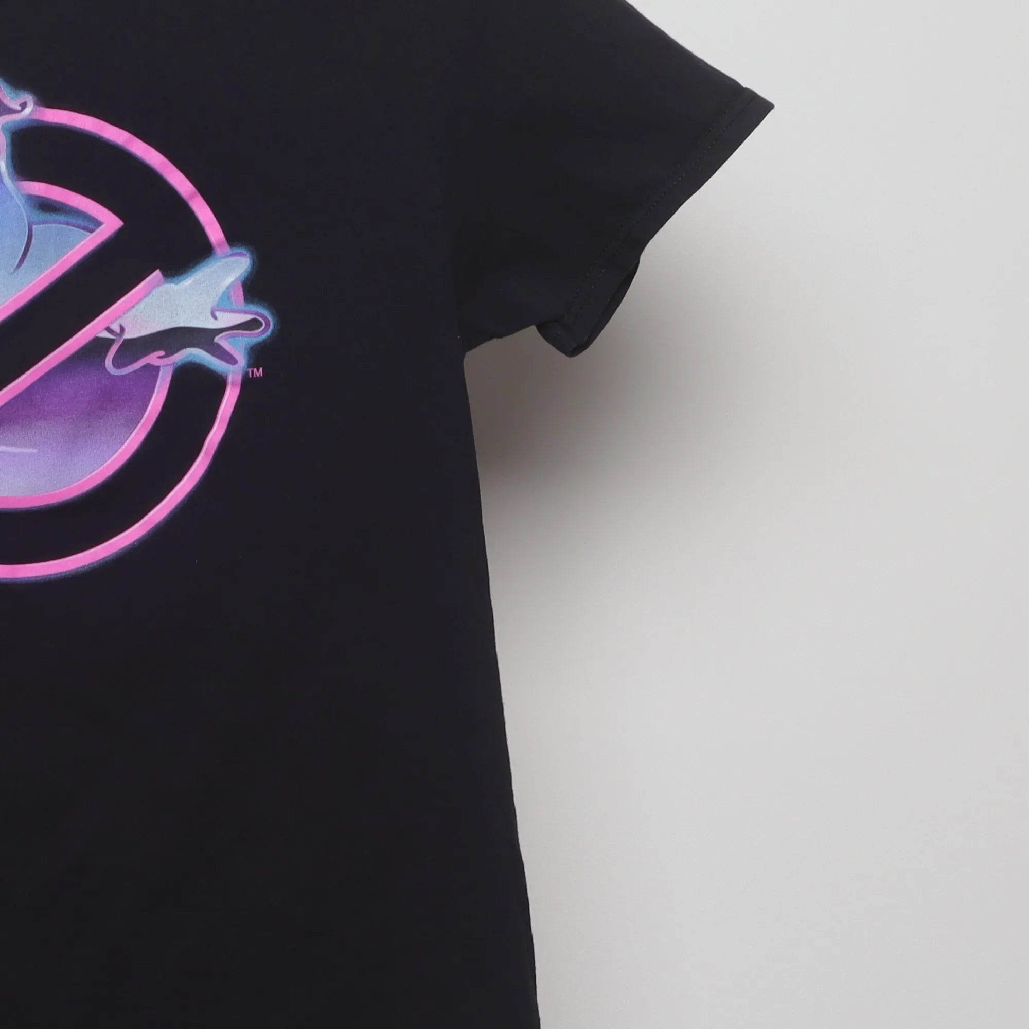 Close-up of the sleeve on the Vintage 2010s Ghostbusters Gradient Logo T-Shirt S