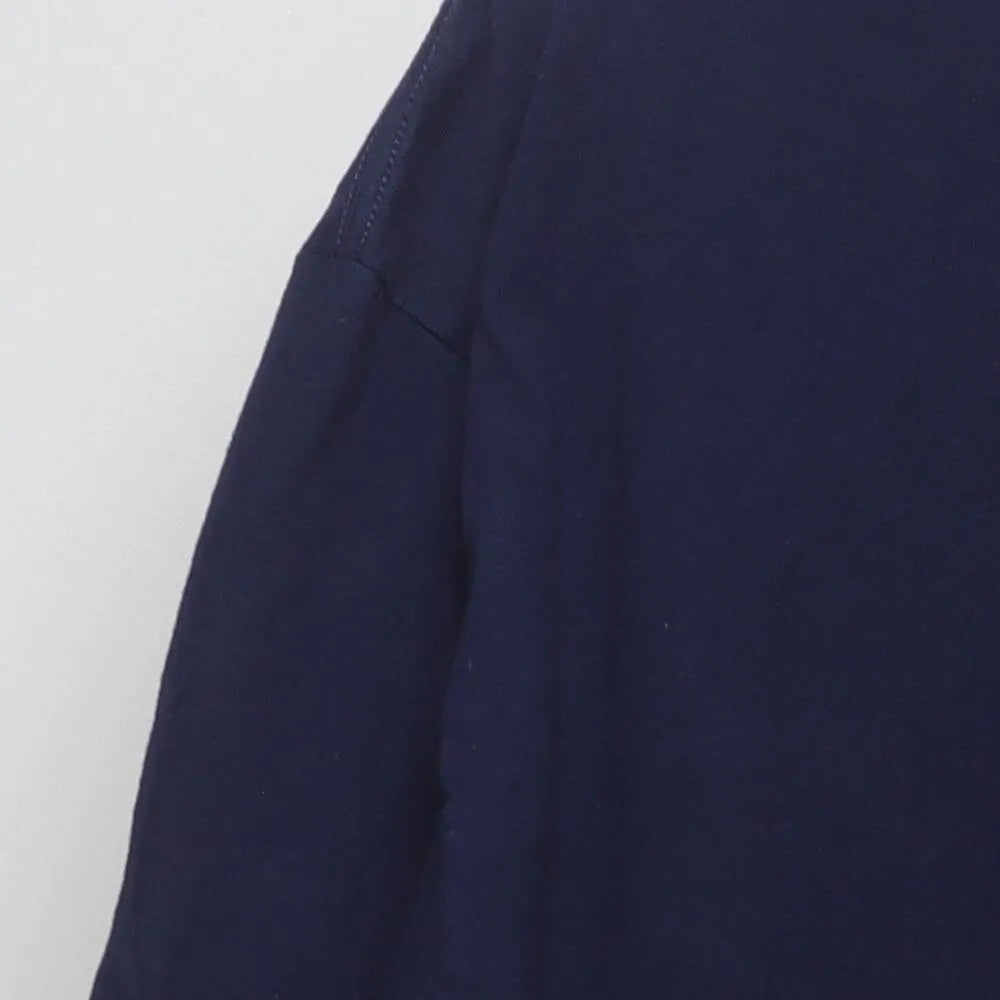 Close-up of the sleeve on the Vintage 2010s In-N-Out Burger "Classic Cars Sunset" T-Shirt - XL