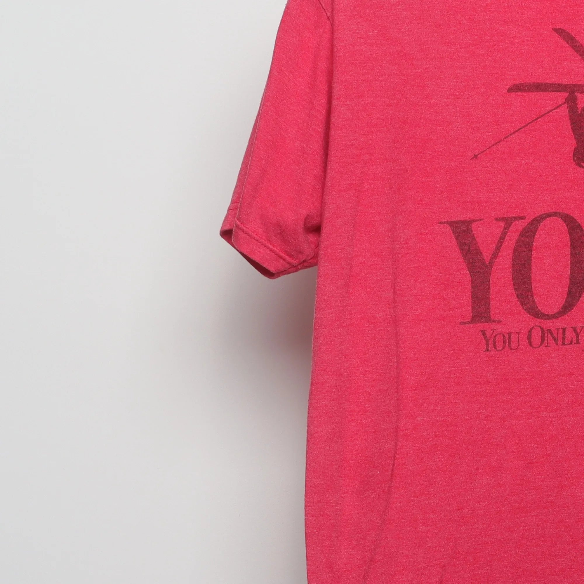 Close-up of the sleeve on the Vintage 2010s Keystone Ski YOLO Graphic T-Shirt M
