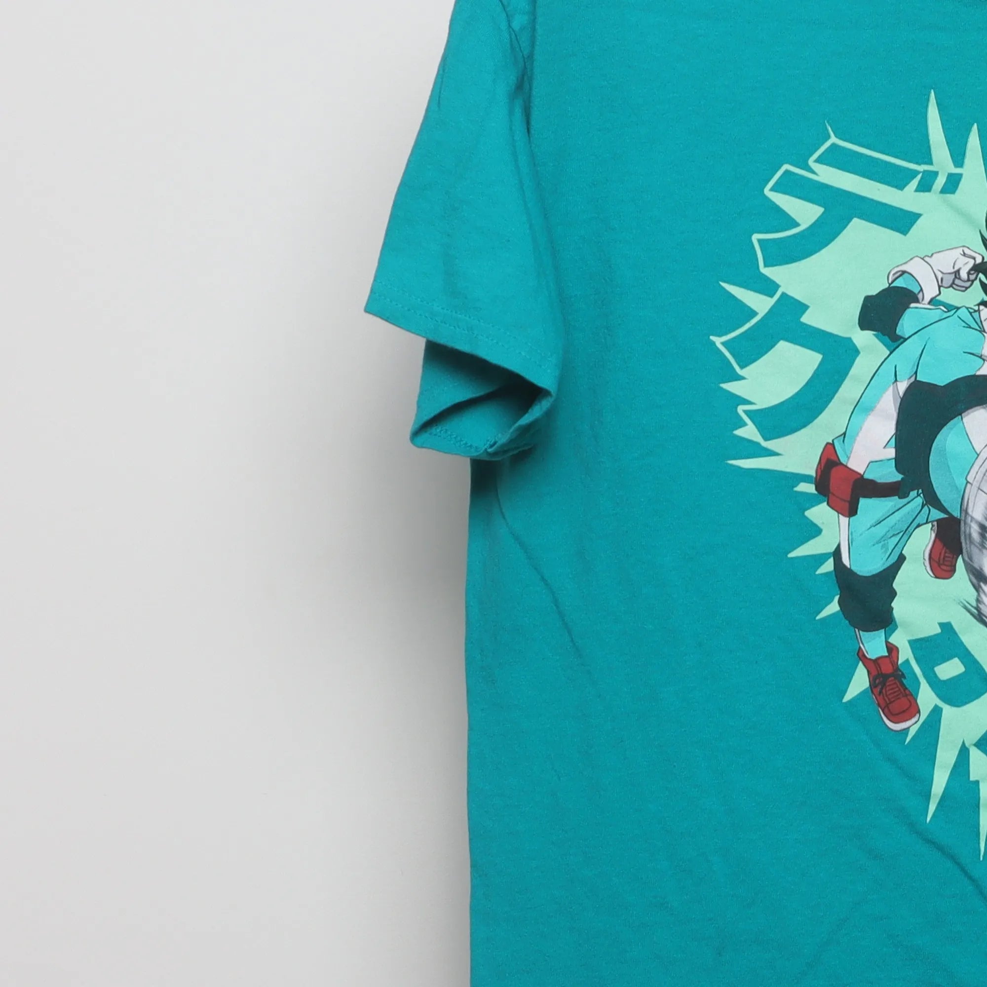 Close-up of the sleeve on the Vintage 2010s My Hero Academia Deku Anime T-Shirt L