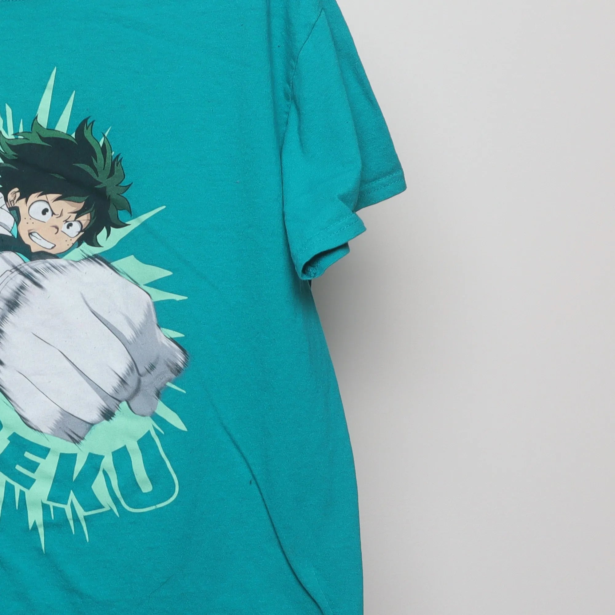 Close-up of the sleeve on the Vintage 2010s My Hero Academia Deku Anime T-Shirt L