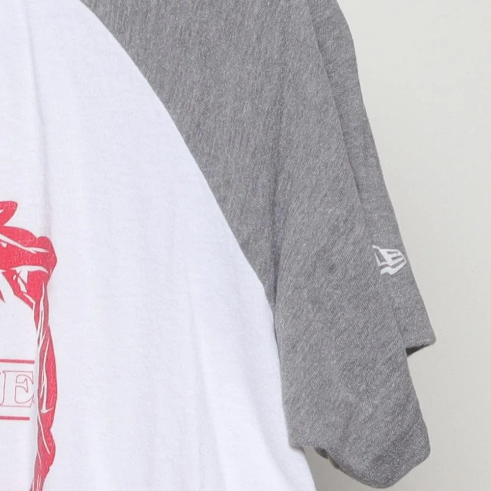 Close-up of the sleeve on the Vintage 2010s New Era / Netflix "Stranger Things 2019 MLB All-Star Game" T-Shirt - L