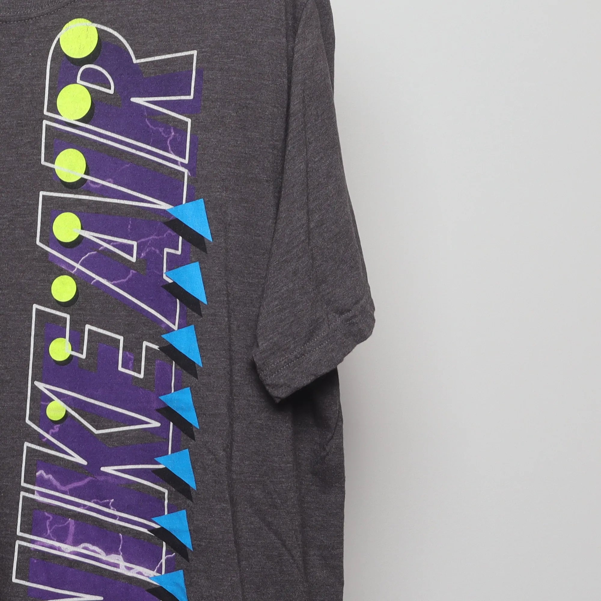 Close-up of the sleeve on the Vintage 2010s Nike Air Graphic T-Shirt XL