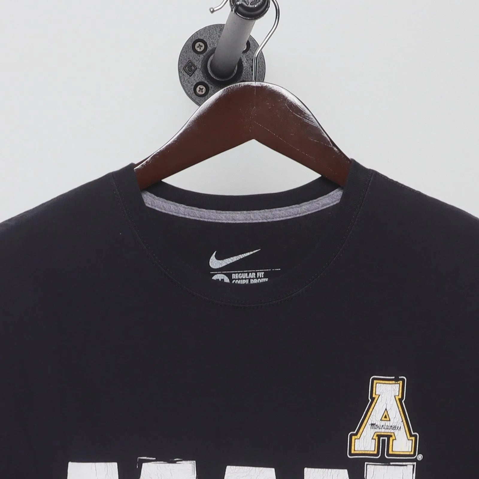 Close-up of the collar and tag on the Vintage 2010s Nike Appalachian State "Man Up" T-Shirt - S
