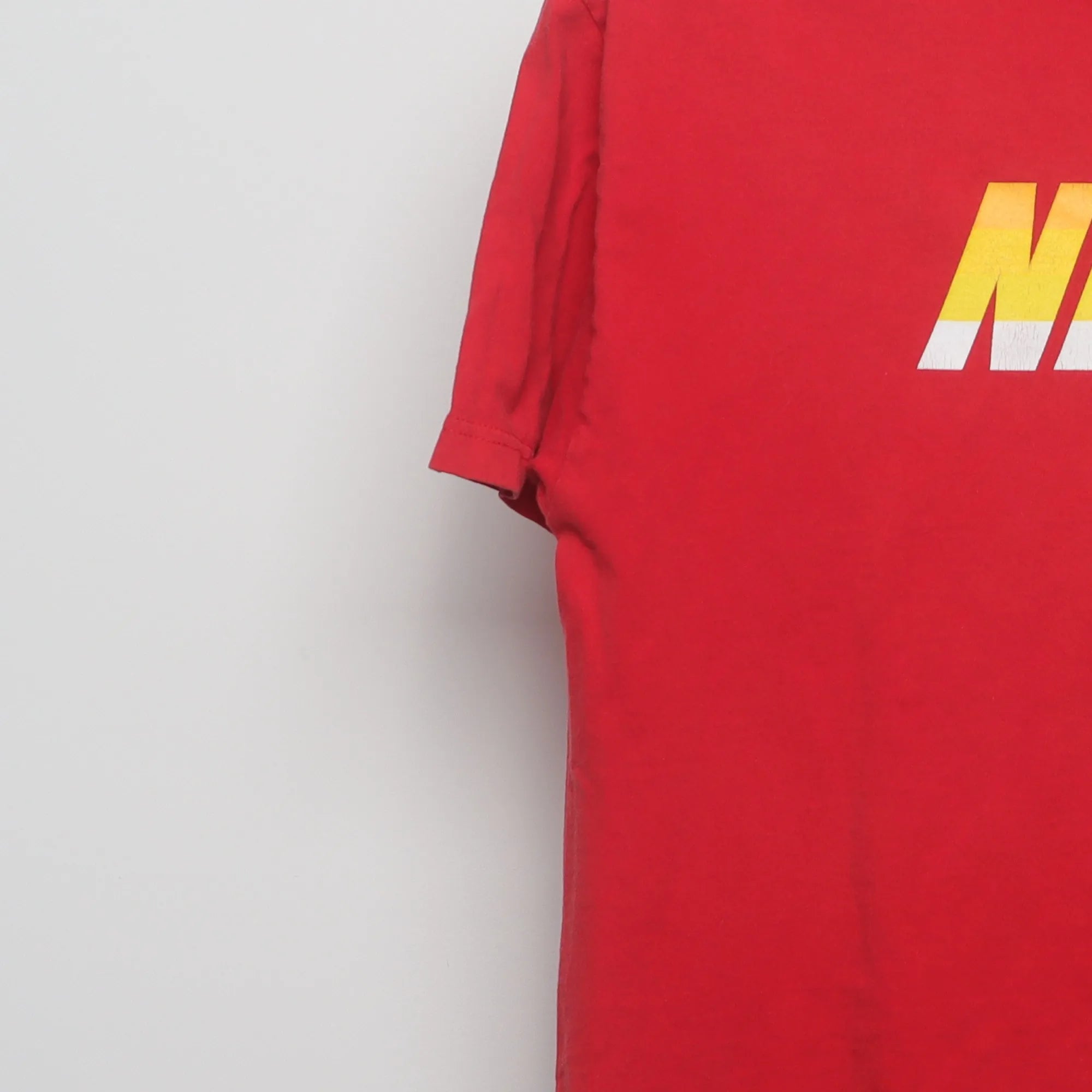 Close-up of the sleeve on the Vintage 2010s Nike Block Logo Graphic T-Shirt L