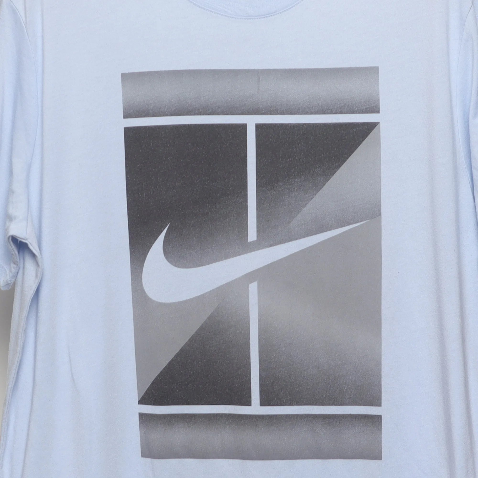 Close-up of the main graphic on the Vintage 2010s Nike Tennis Court Graphic T-Shirt XL