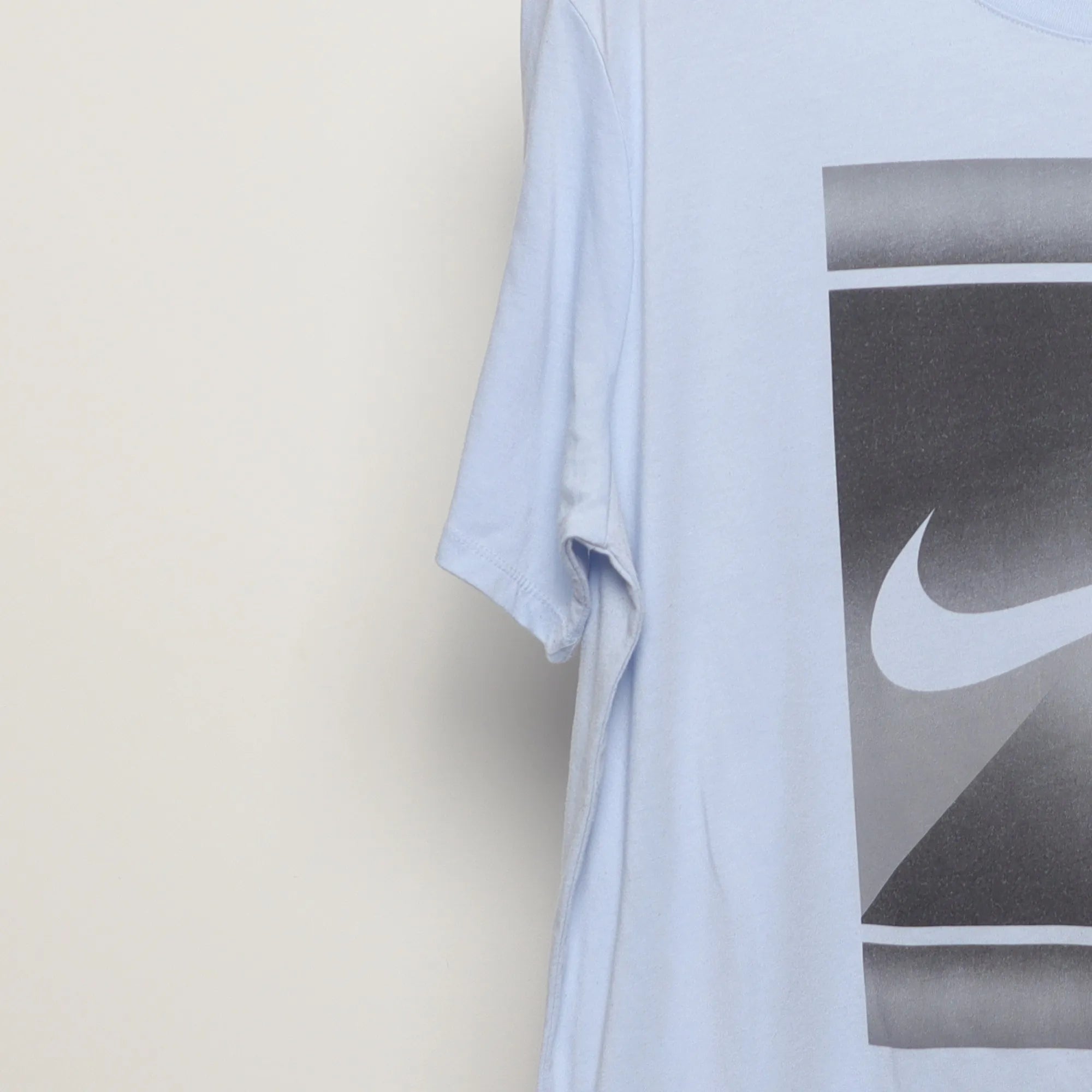 Close-up of the sleeve on the Vintage 2010s Nike Tennis Court Graphic T-Shirt XL