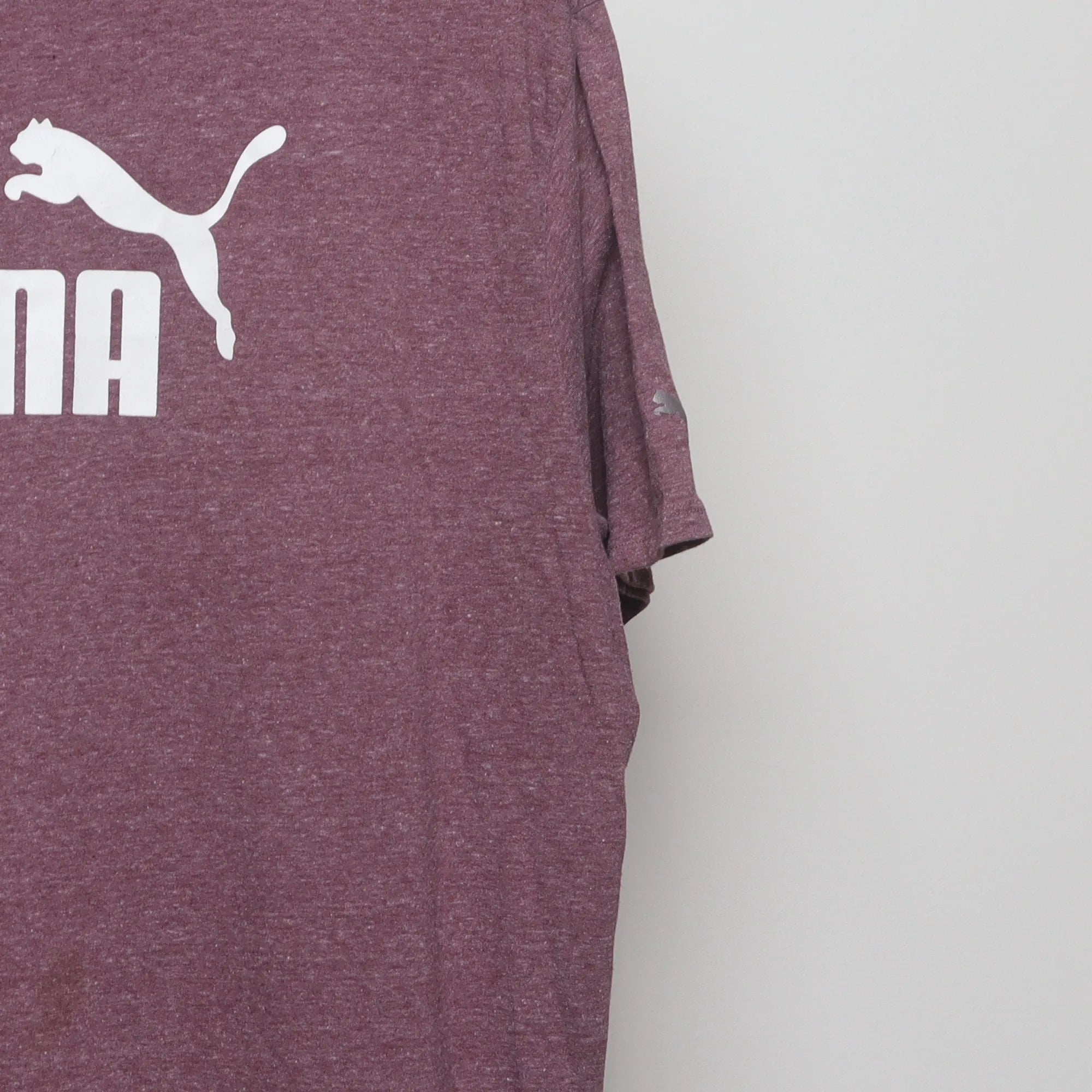 Close-up of the sleeve on the Vintage 2010s Puma Big Logo Heathered T-Shirt XL