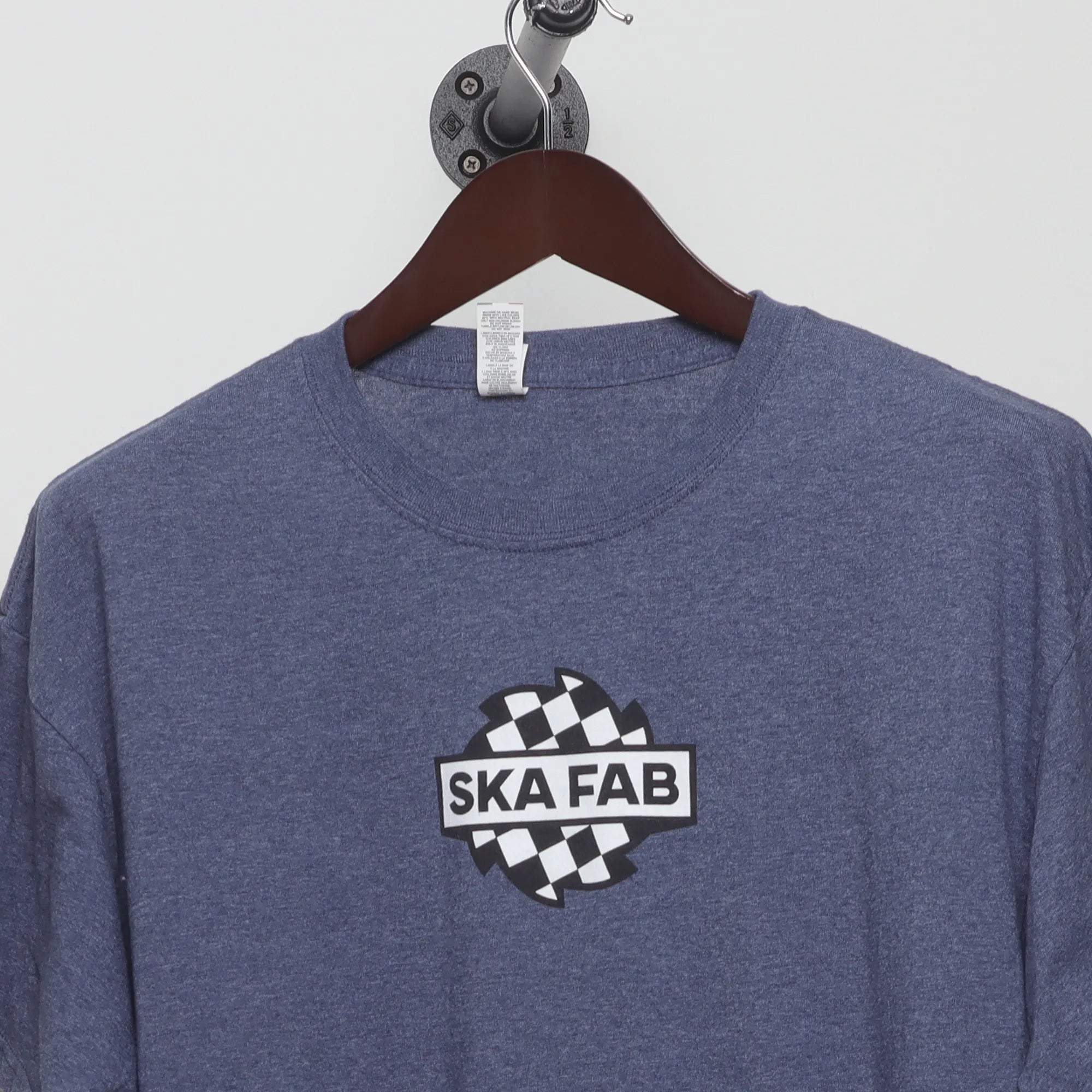 Close-up of the collar and tag on the Vintage 2010s Ska Fab Checkerboard T-Shirt M