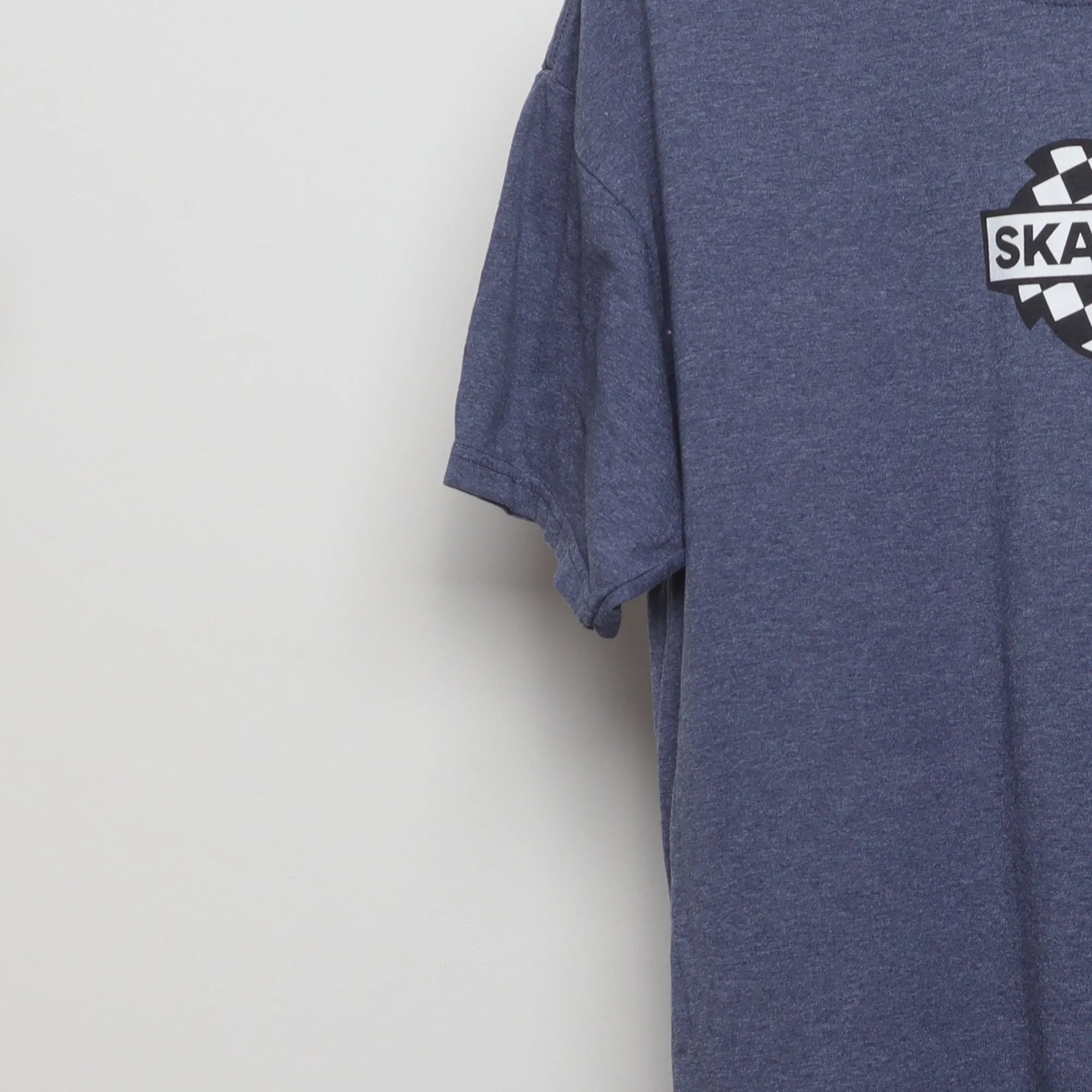 Close-up of the sleeve on the Vintage 2010s Ska Fab Checkerboard T-Shirt M