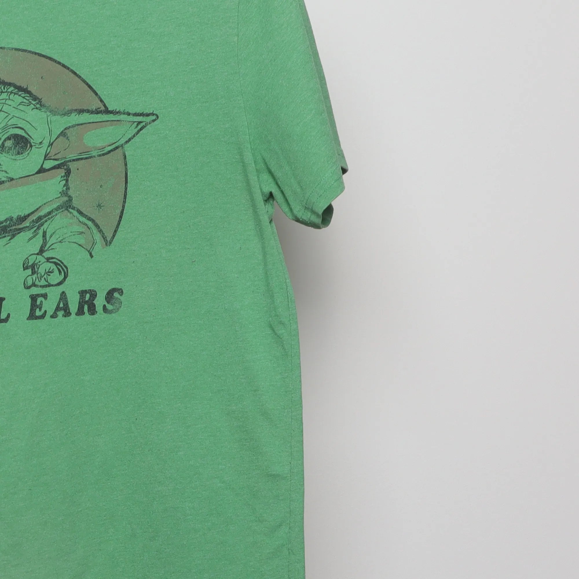 Close-up of the sleeve on the Vintage 2010s Star Wars Grogu 'I'm All Ears' Tee M