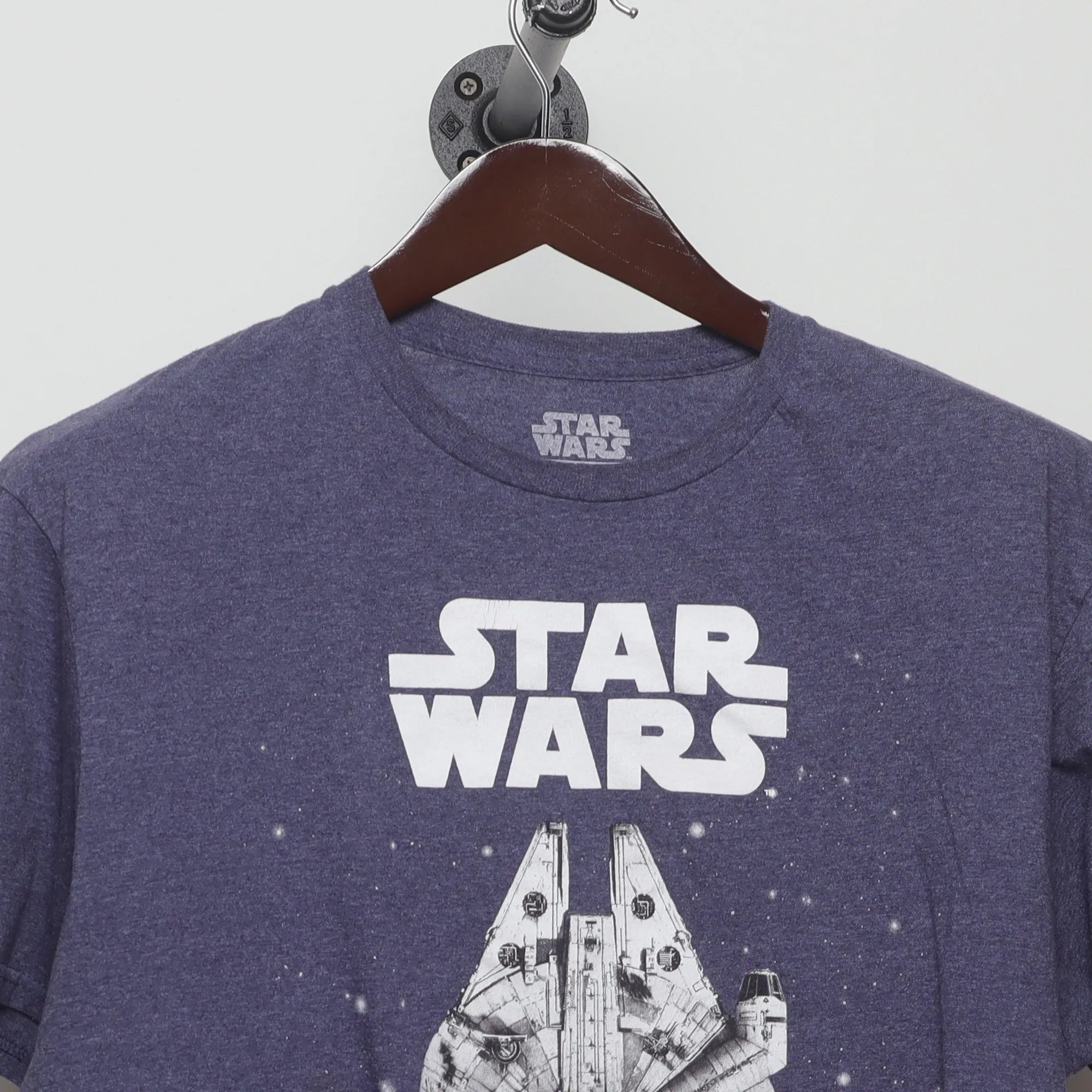 Close-up of the collar and tag on the Vintage 2010s Star Wars Millennium Falcon T-Shirt M