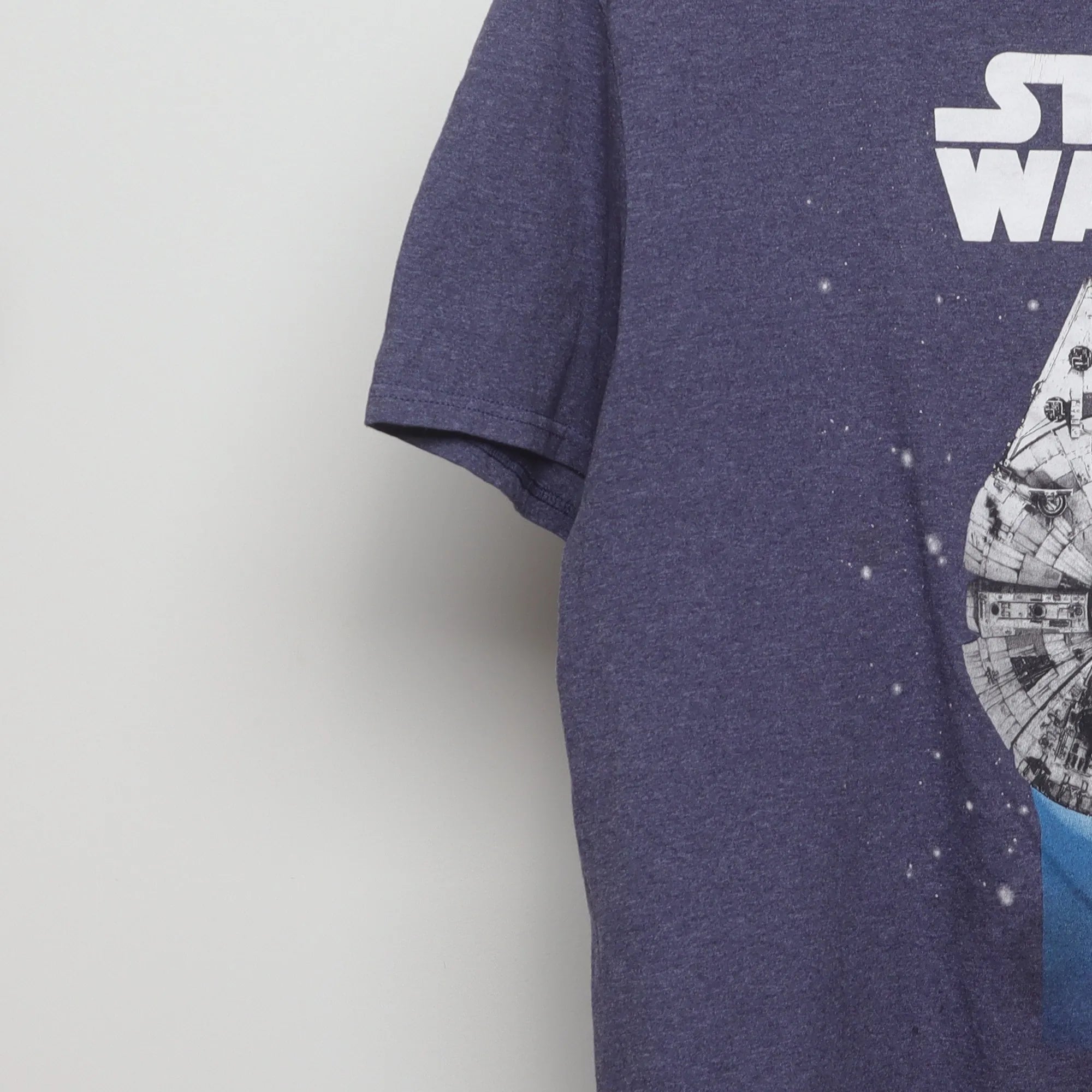 Close-up of the sleeve on the Vintage 2010s Star Wars Millennium Falcon T-Shirt M
