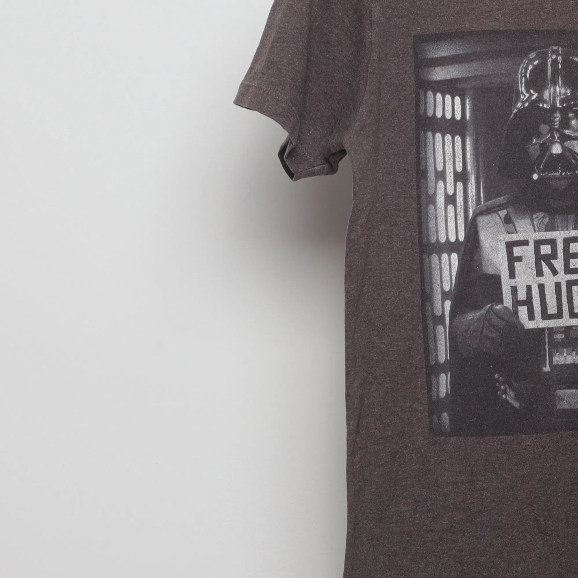 Close-up of the sleeve on the Vintage 2010s Star Wars Vader Free Hugs T-Shirt S