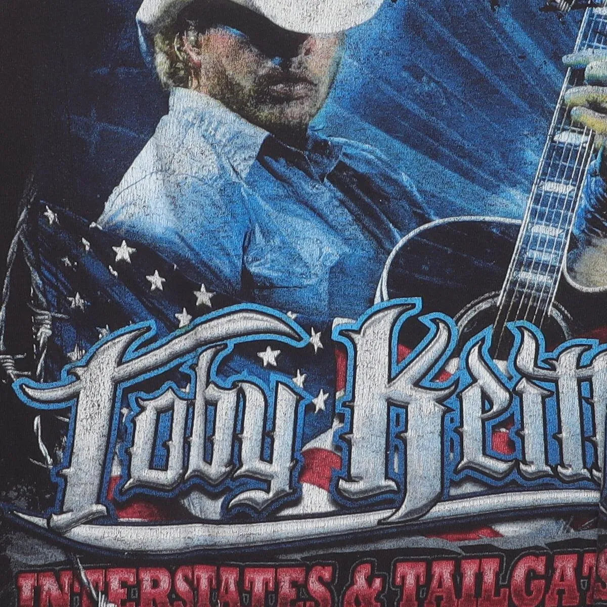 Close-up of the main graphic on the Vintage 2010s Toby Keith "Interstates & Tailgates" T-Shirt - XL