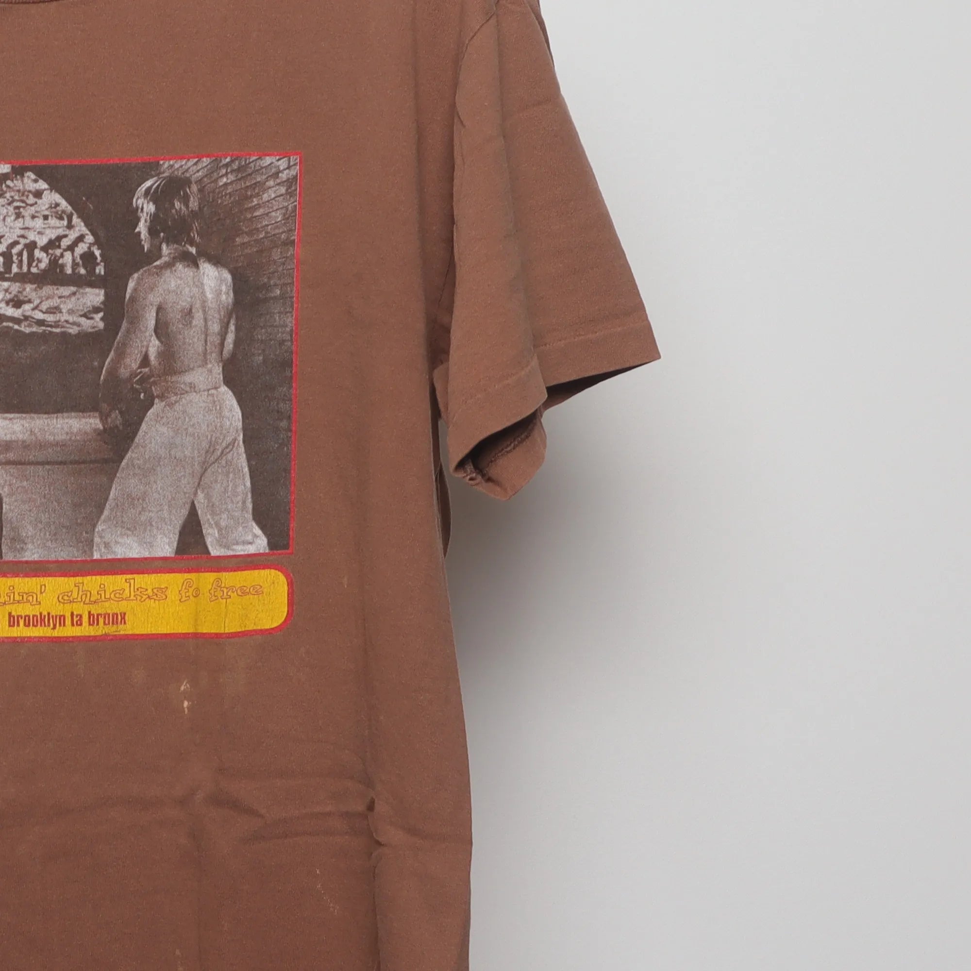 Close-up of the sleeve on the Vintage 90s Bruce Lee Soulflexin Single Stitch Tee XL